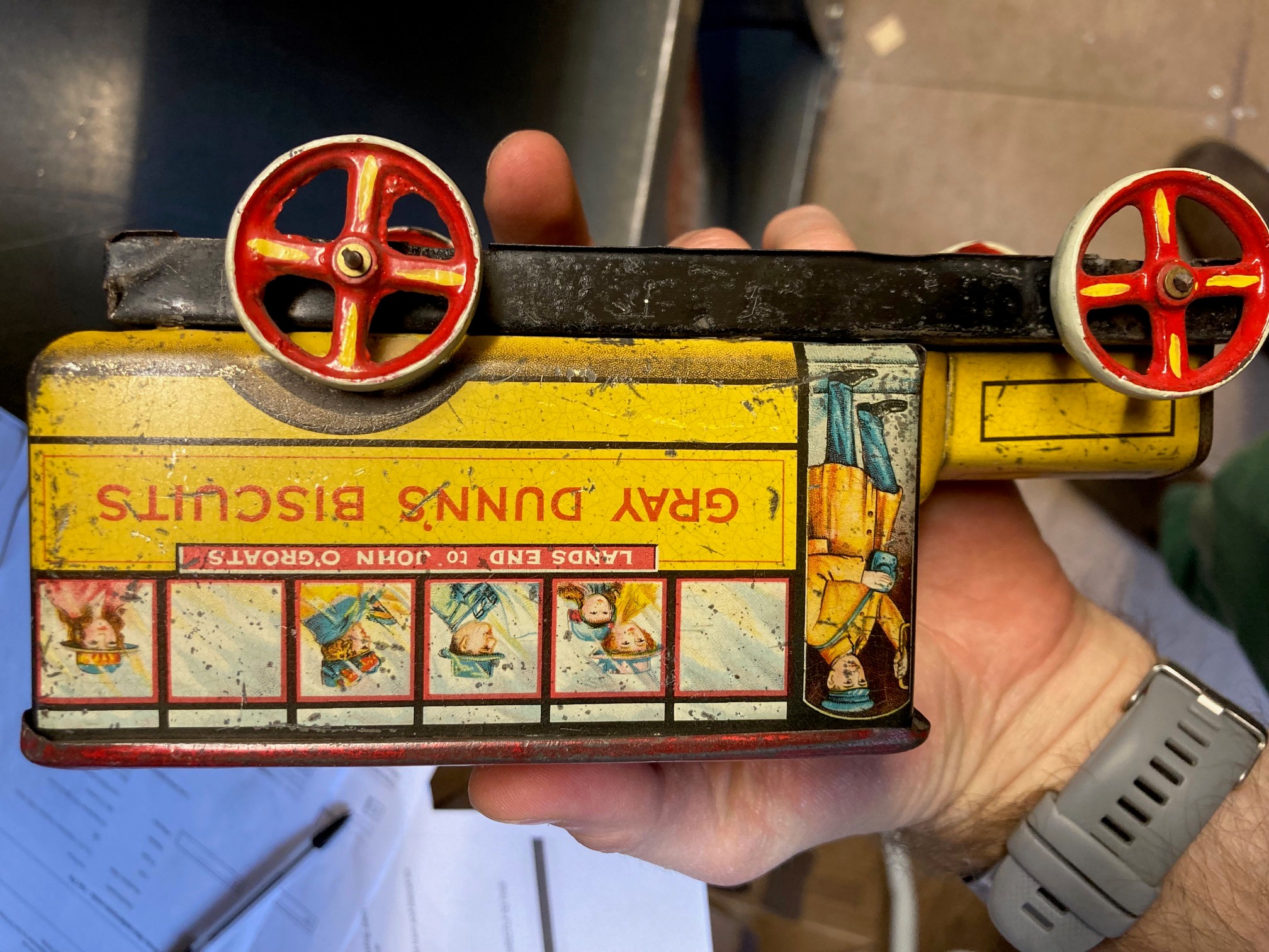 Tinplate biscuit tin tram and Gray Dunns biscuits bus, some rusting, paint damage fair and a Image