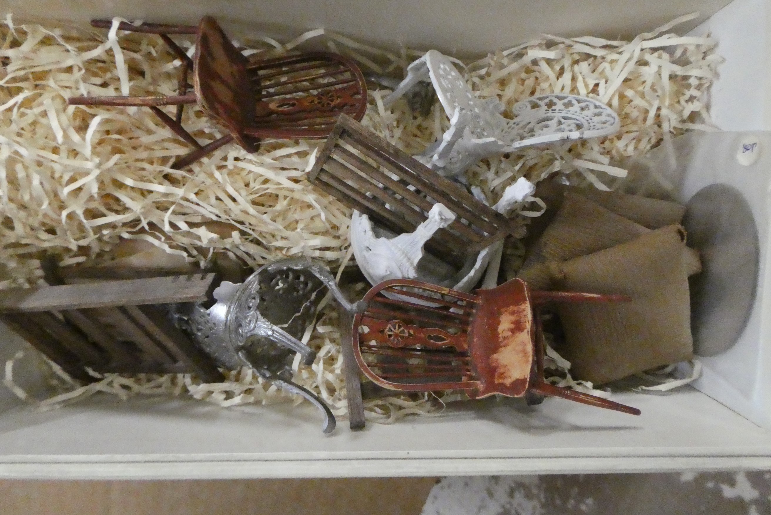 A collection of dolls house furniture and accessories Image