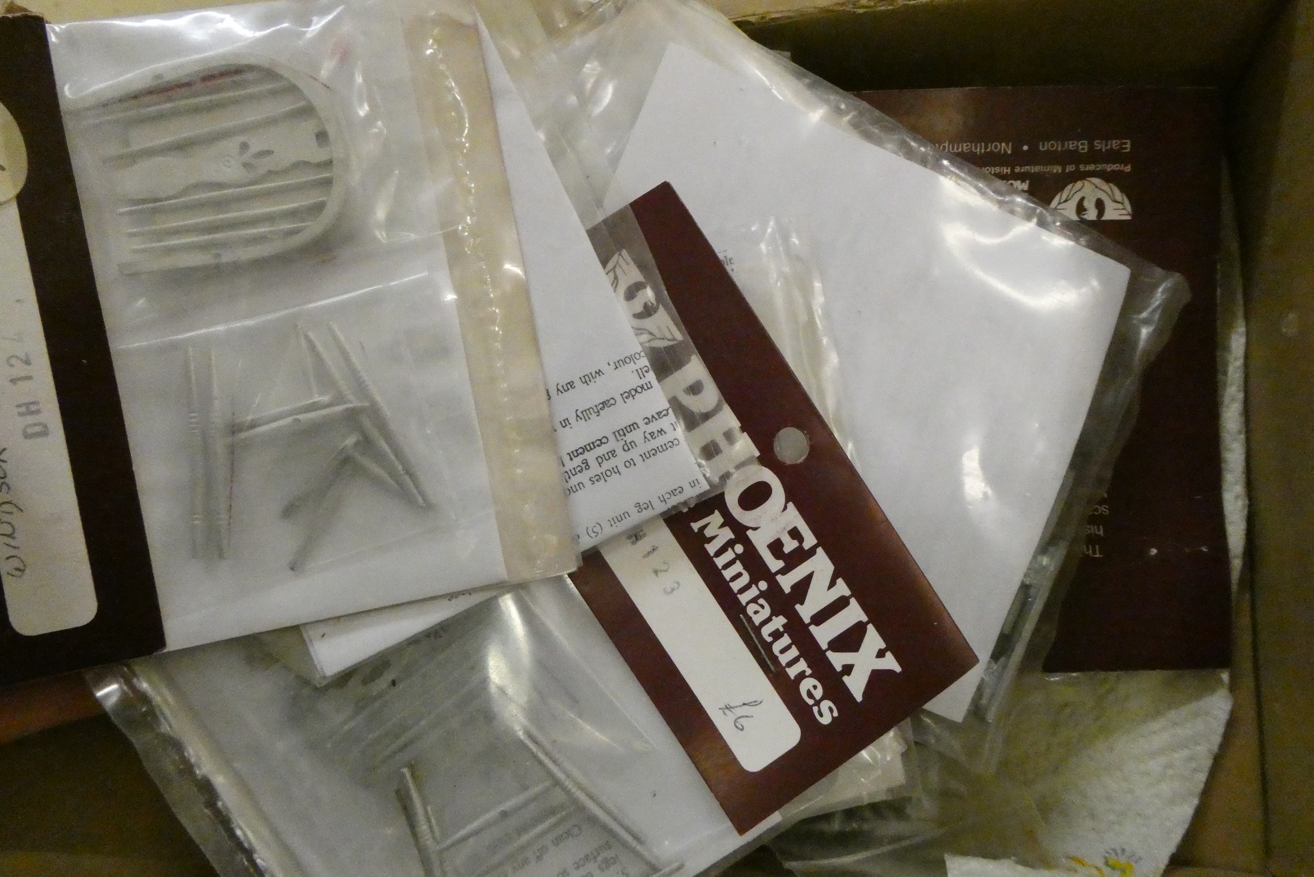 A collection of dolls house furniture and accessories Image