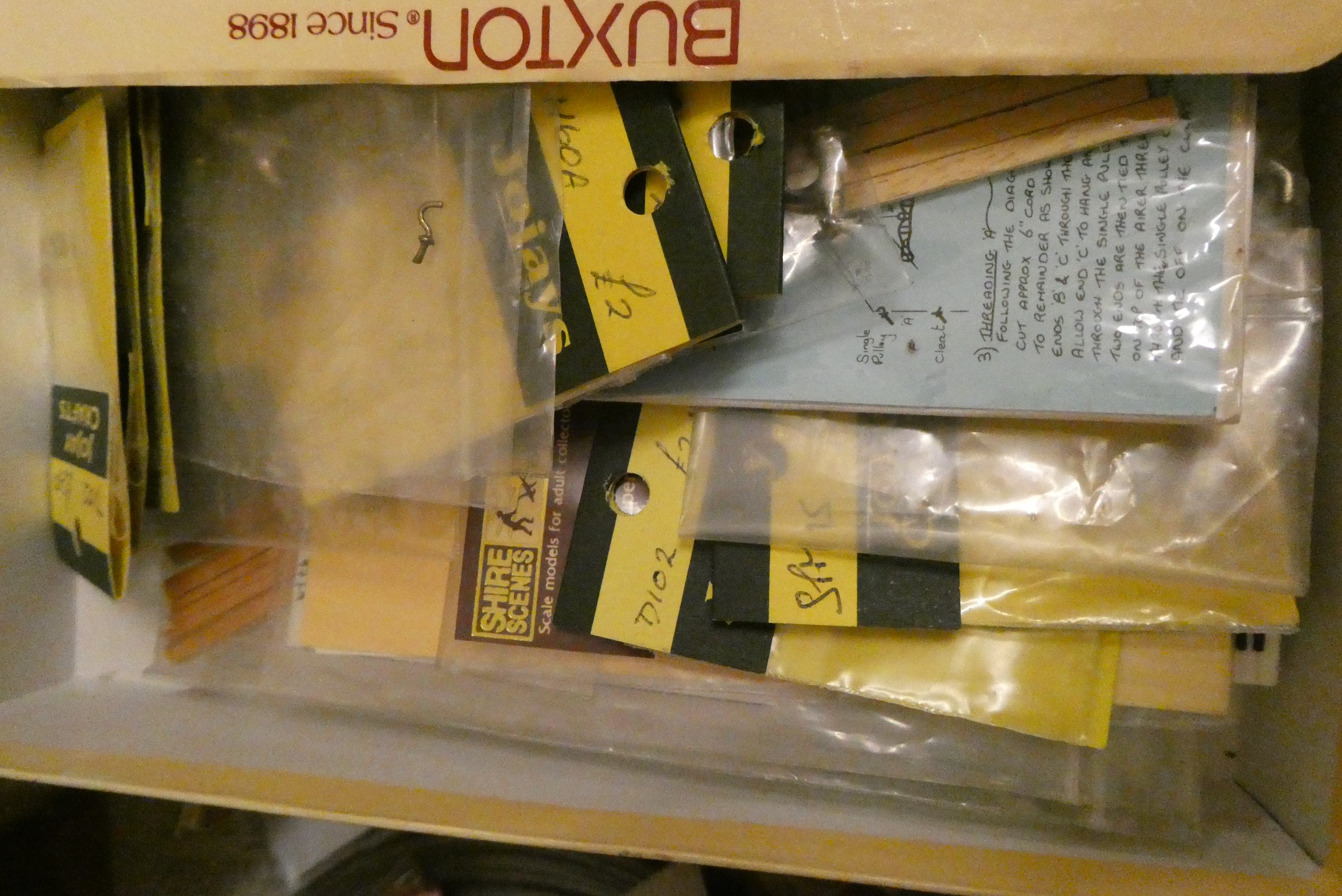 A collection of dolls house furniture and accessories Image