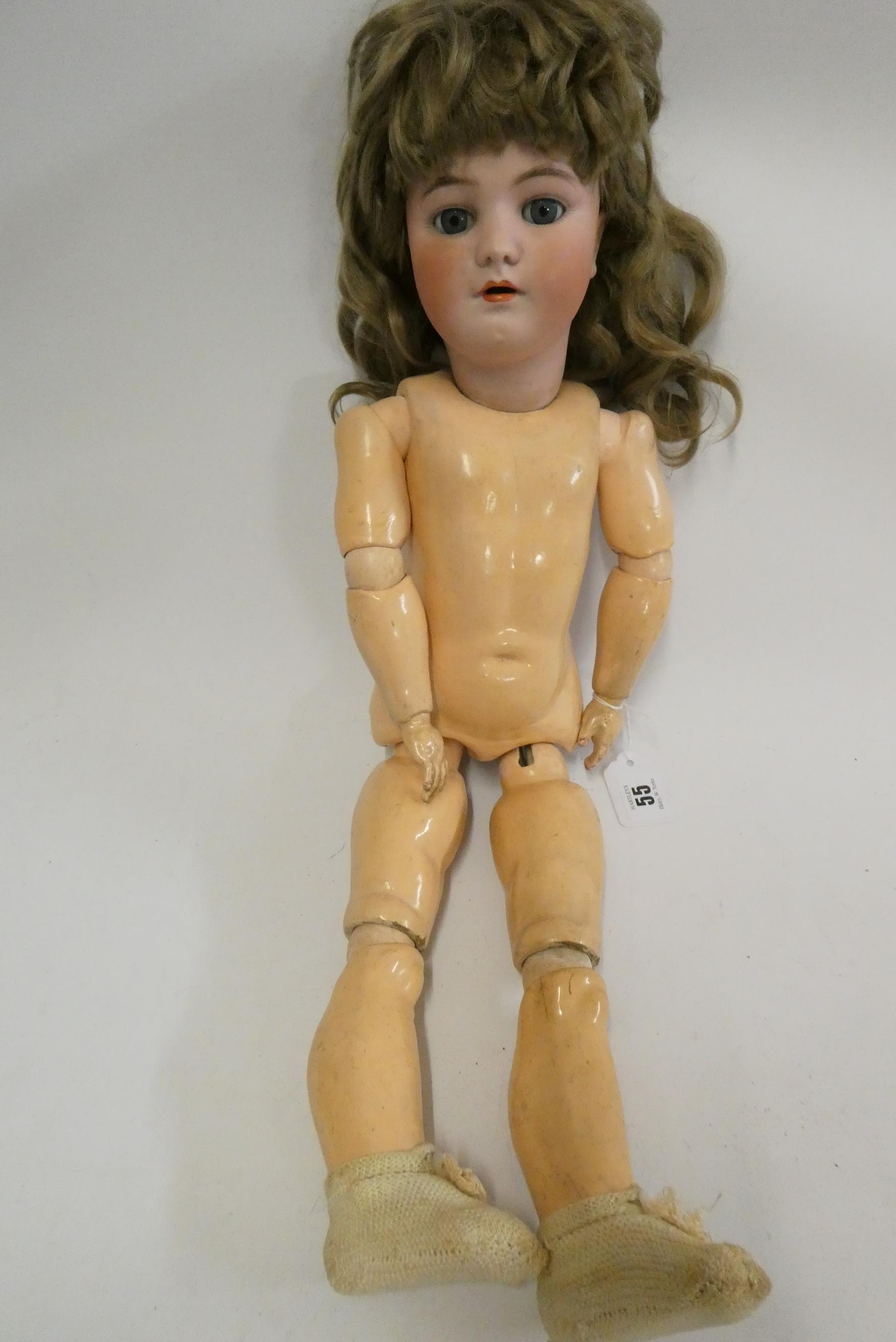 A Heinrich Handwerck Simon & Halbig bisque socket head doll, with blue glass sleeping eyes, open Image