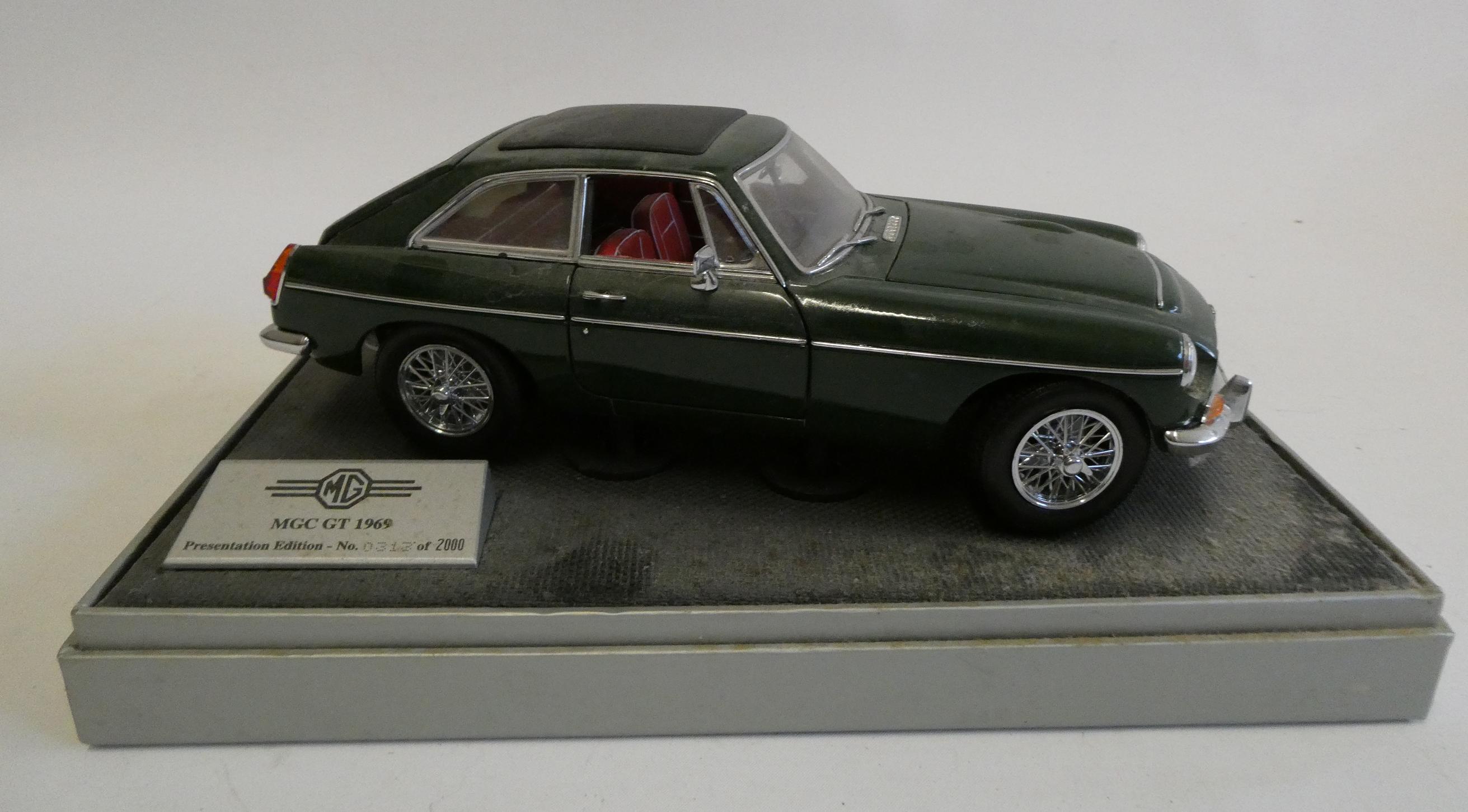 Heritage Motor Centre 1:18th scale model MGC GT 1969 finished in British Racing green, very dusty Image