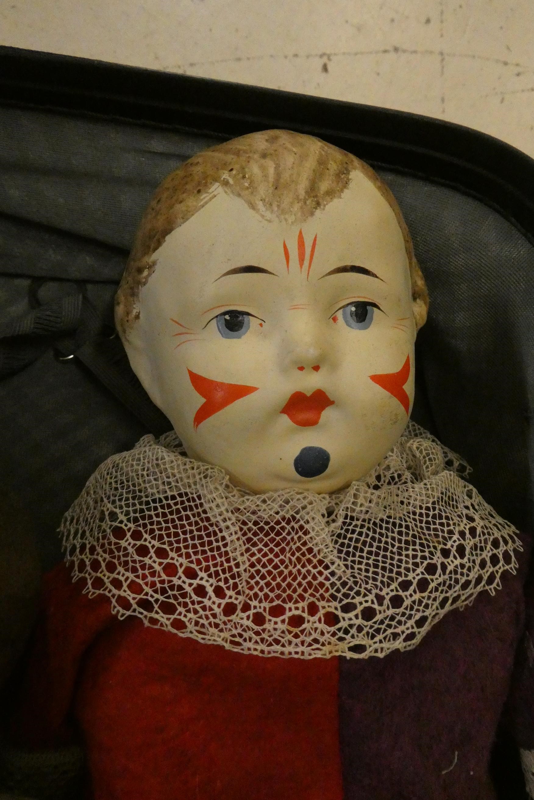 Four collectors dolls, comprising a part Victorian peg doll, a composition Japanese doll, a Image