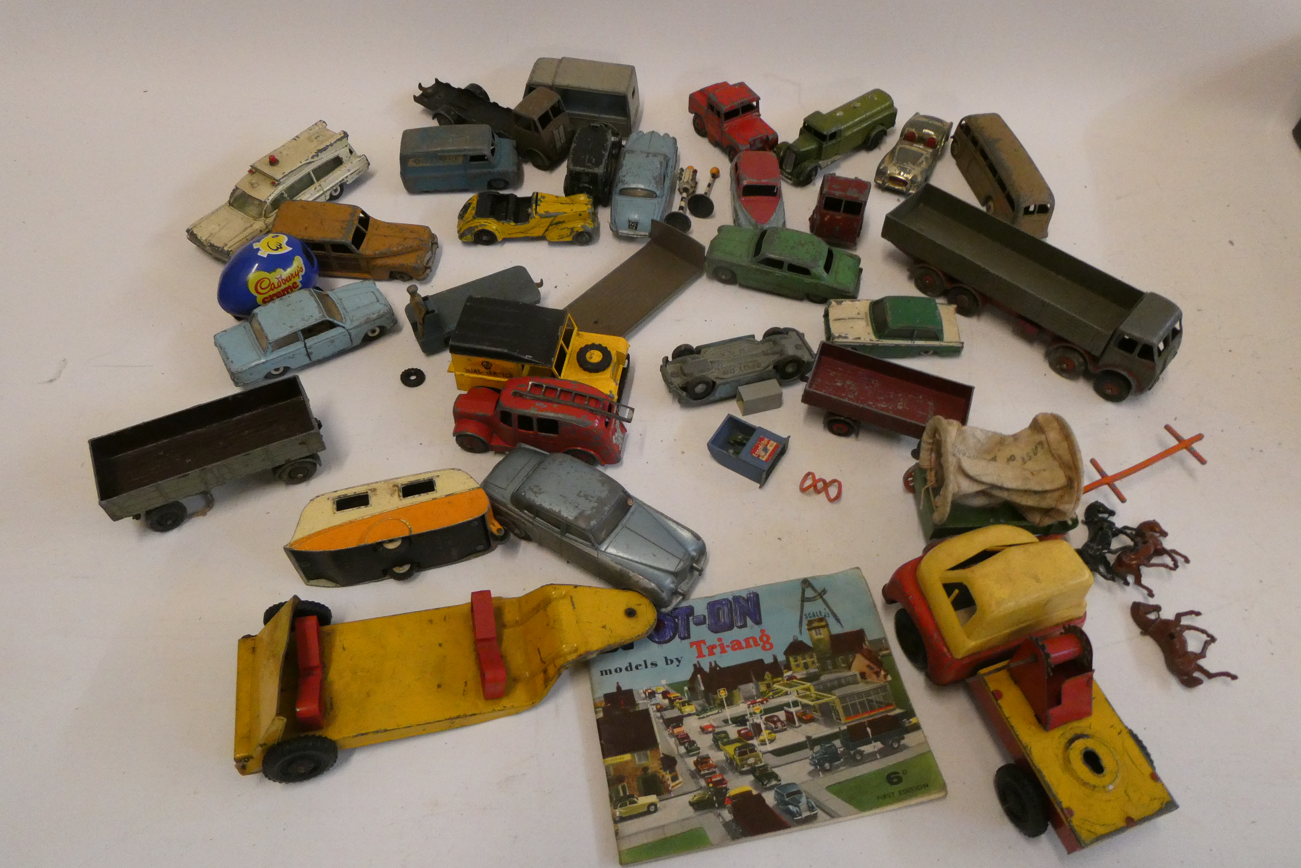 Playworn diecast vehicles, most items by Dinky including tinplate lorry and Spot On catalogue, fair Image