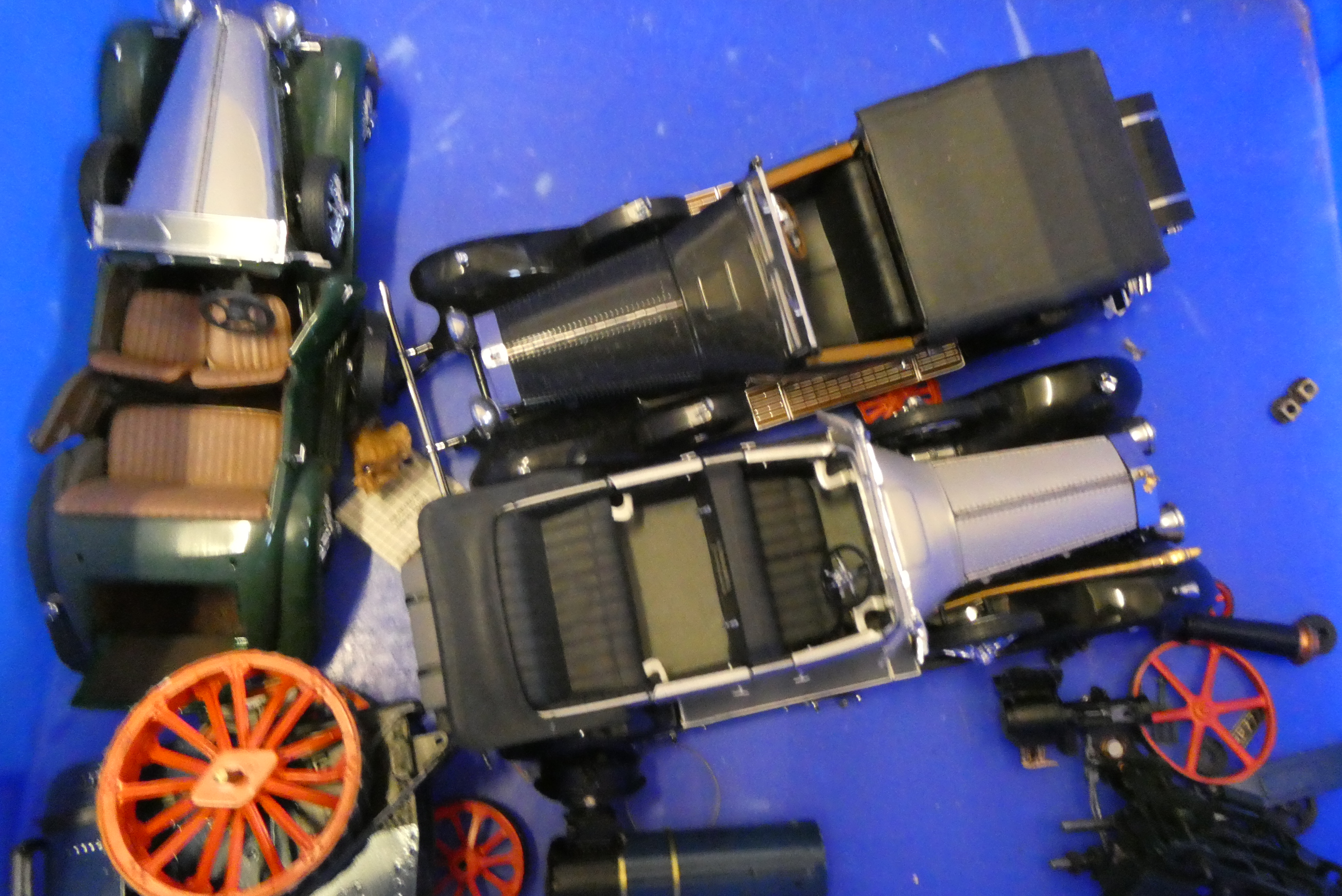 Three Franklin Mint 1/25th scale Classic cars, all items have some damage, and some parts of a Image