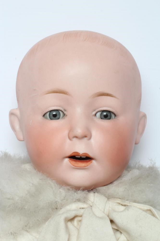 A German bisque head boy character doll Image