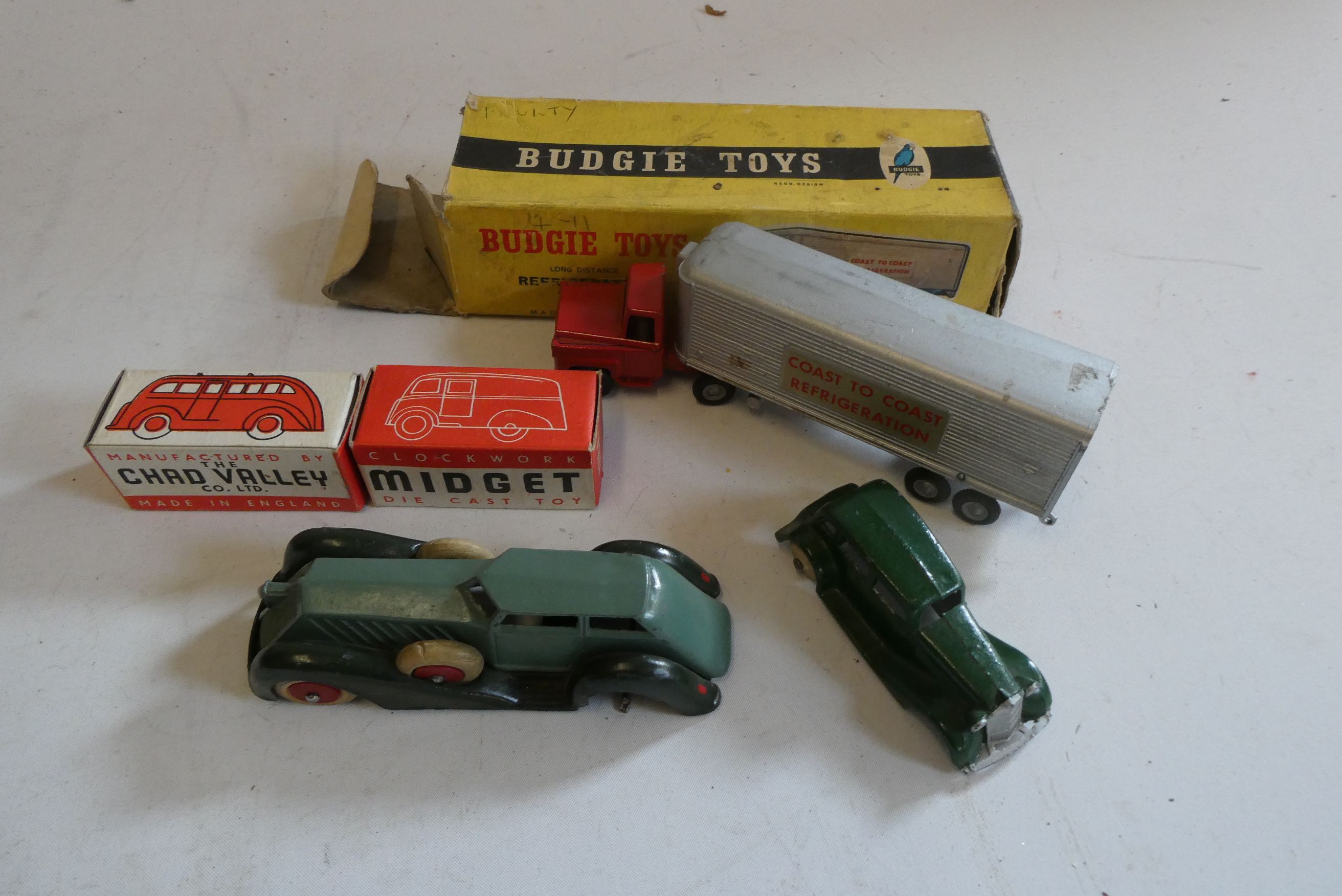 Two Chad Valley diecast clockwork vans Image