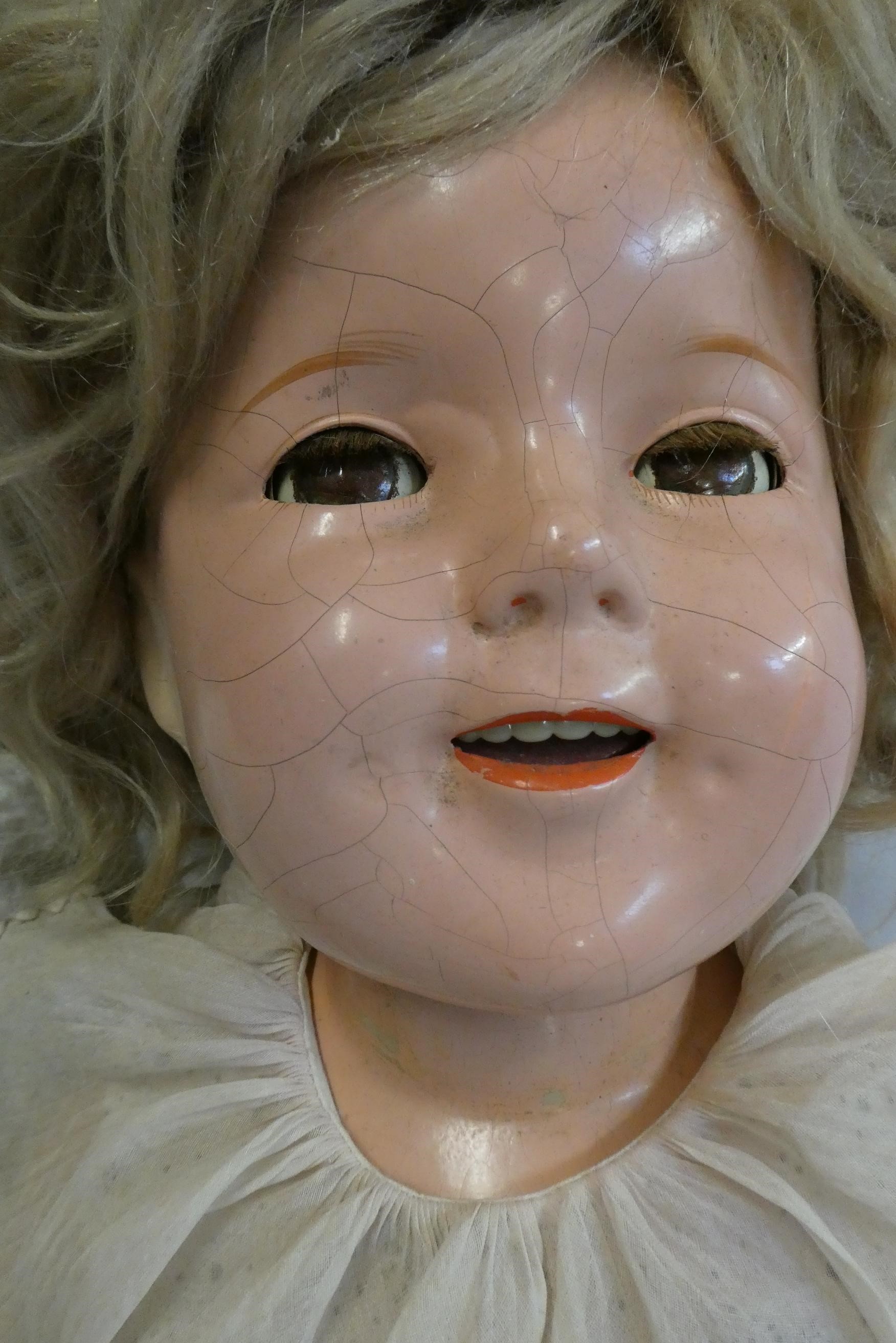 A bisque socket head character doll Image