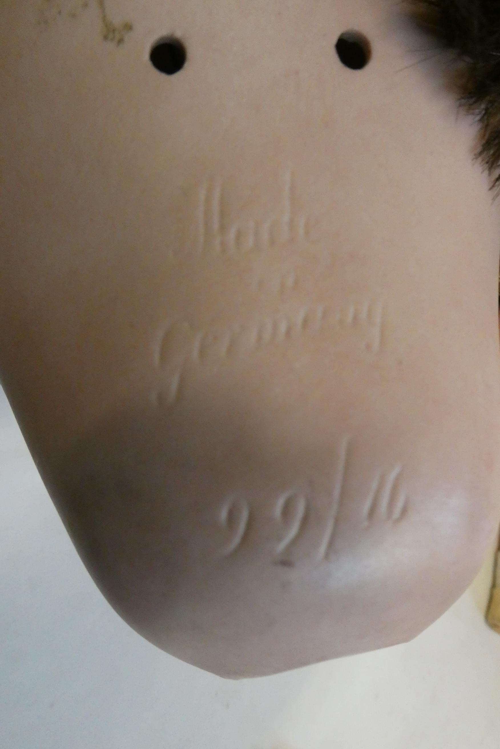 A bisque socket head character doll Image