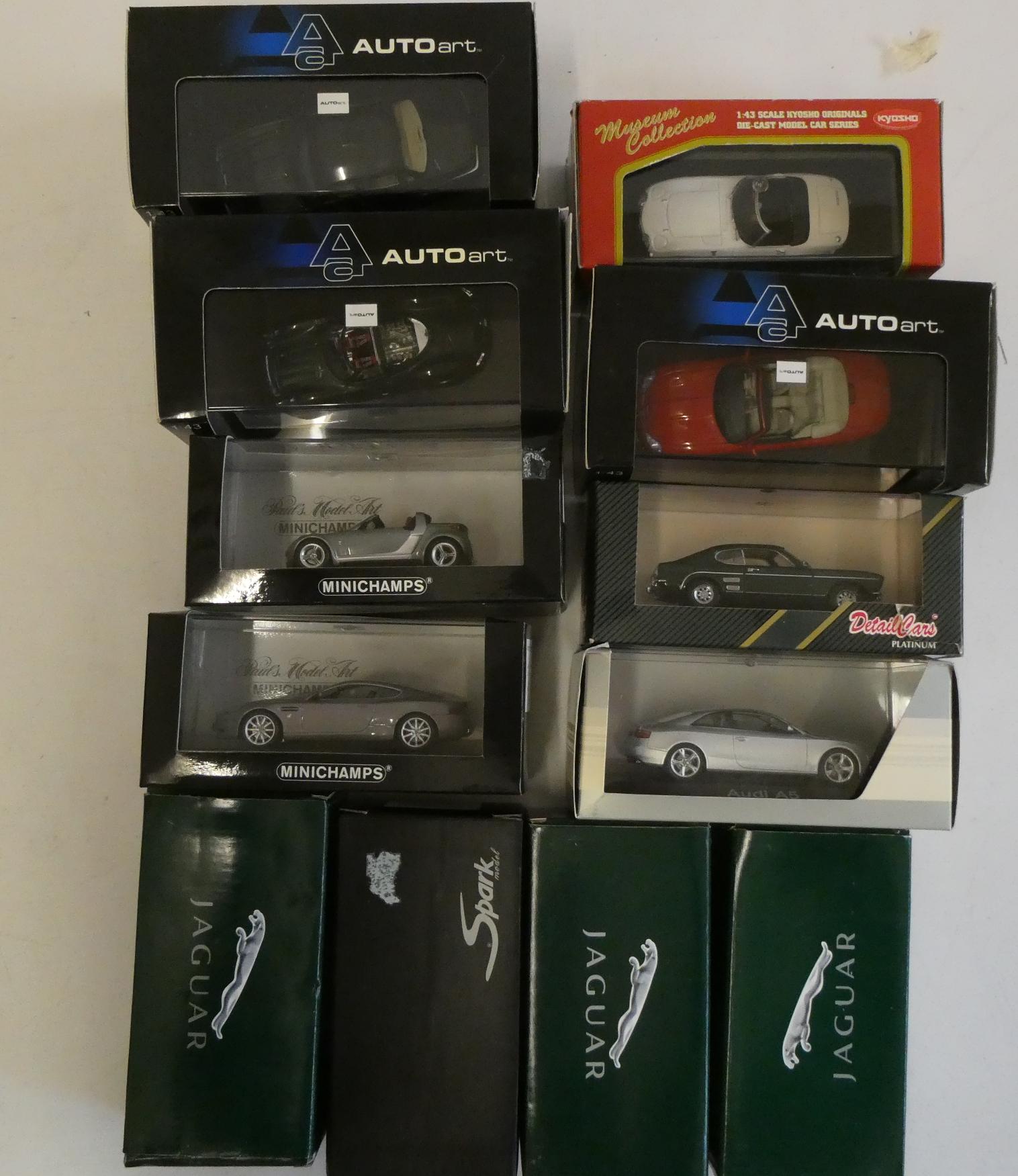 Twelve 1/43rd scale modern model cars by Auto Art Mini Champs and others including Jaguar Ford and Image