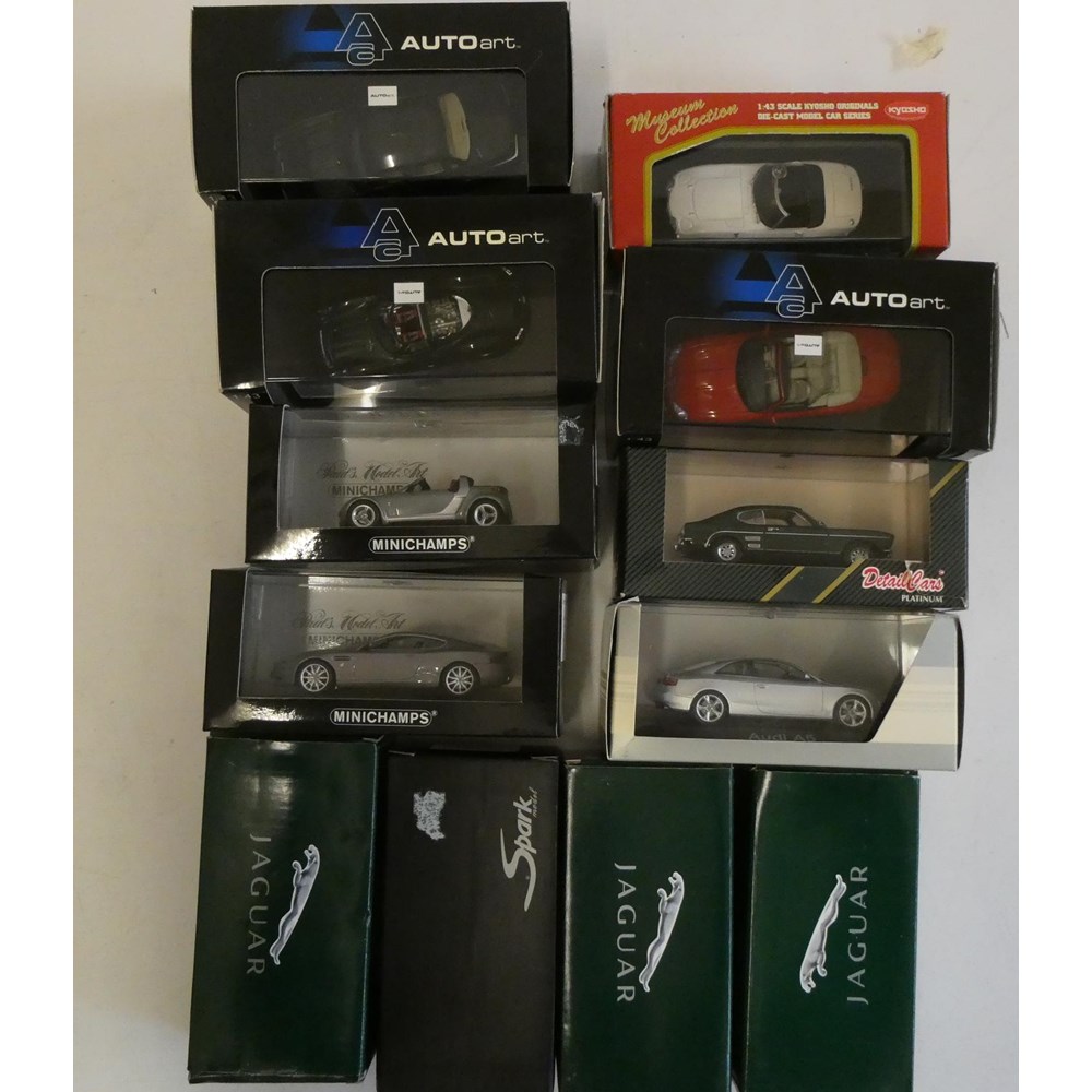 Twelve 1/43rd scale modern model cars by Auto Art Mini Champs and others including Jaguar Ford and Image