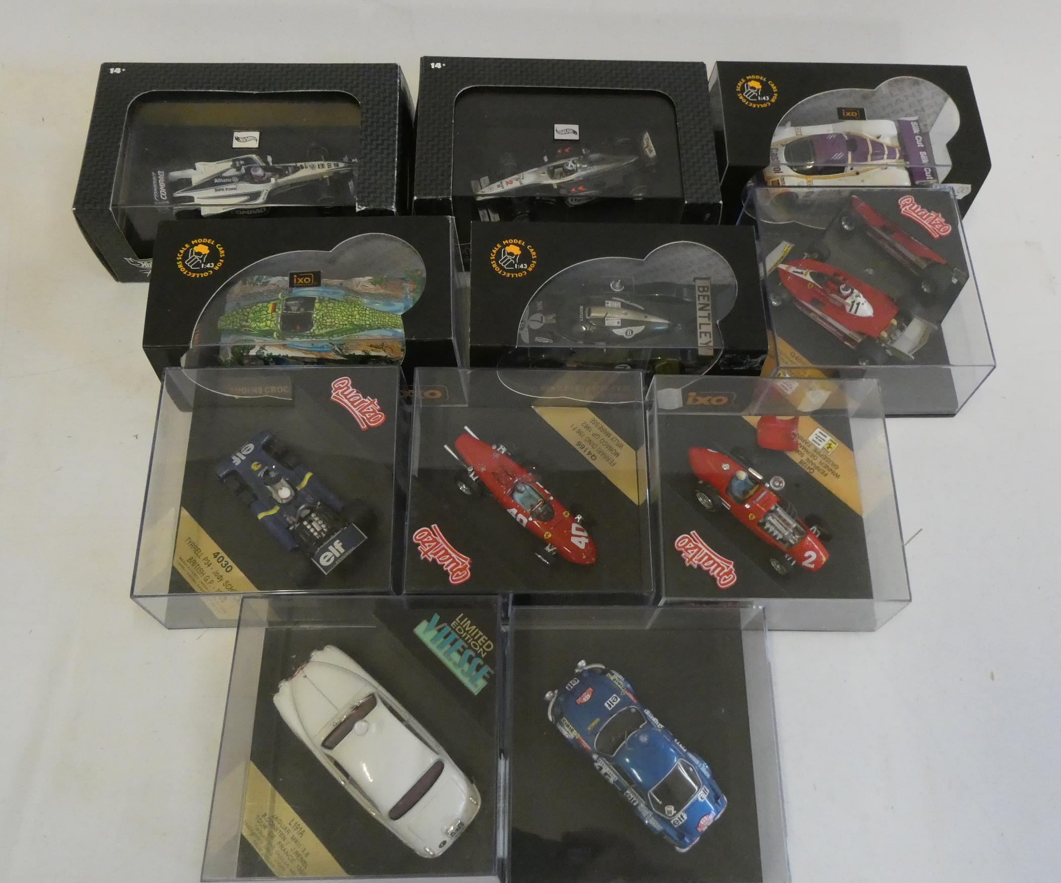 Eleven vintage and modern race cars by IXO, Hot Wheels and others including Ferrari and Jaguar, all Image