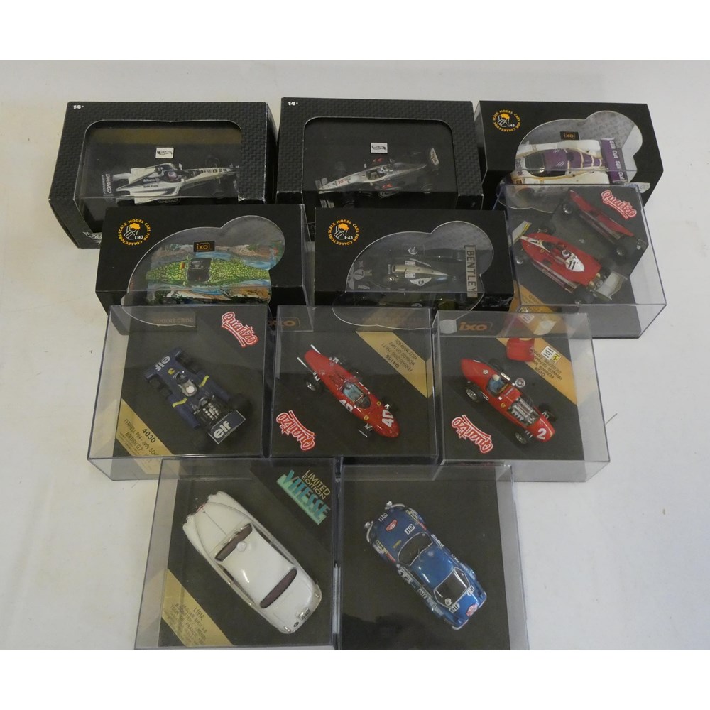Eleven vintage and modern race cars by IXO, Hot Wheels and others including Ferrari and Jaguar, all Image