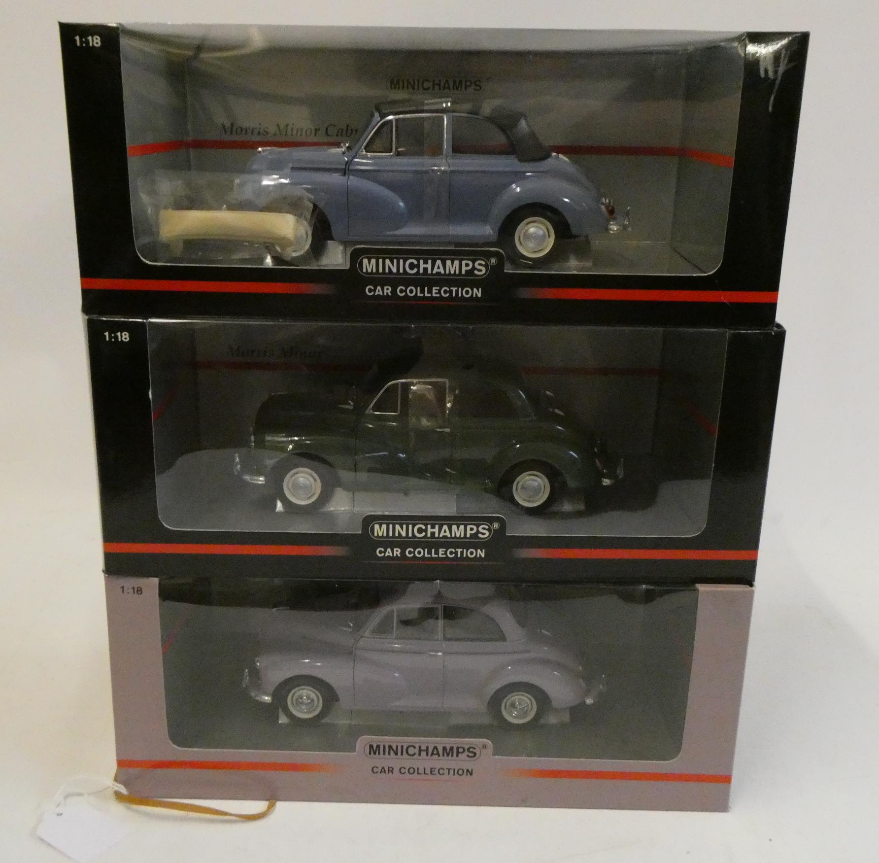 Three Mini Champs 1/18th scale Morris Minors comprising Morris Traveller and police car, and a Image