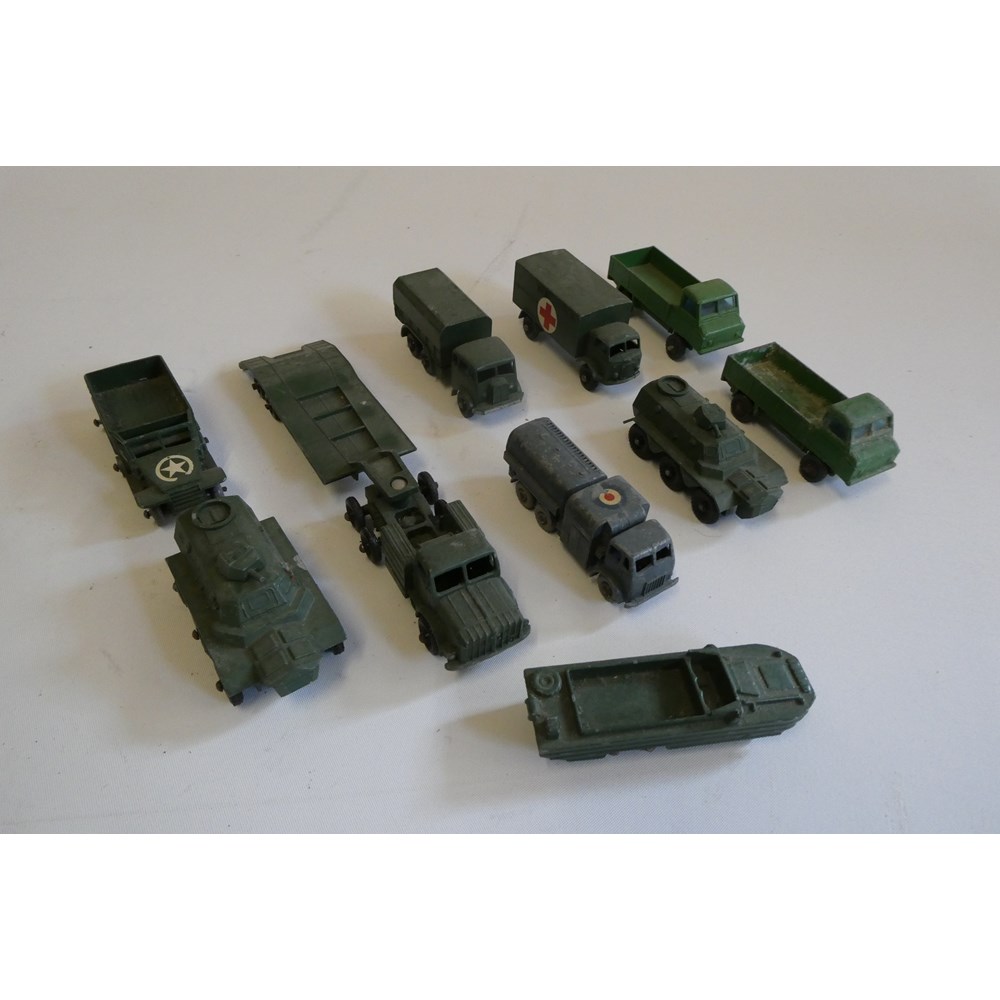 Eight Matchbox military vehicles including tank transporter, ambulance and 10 tonne truck, all items Image