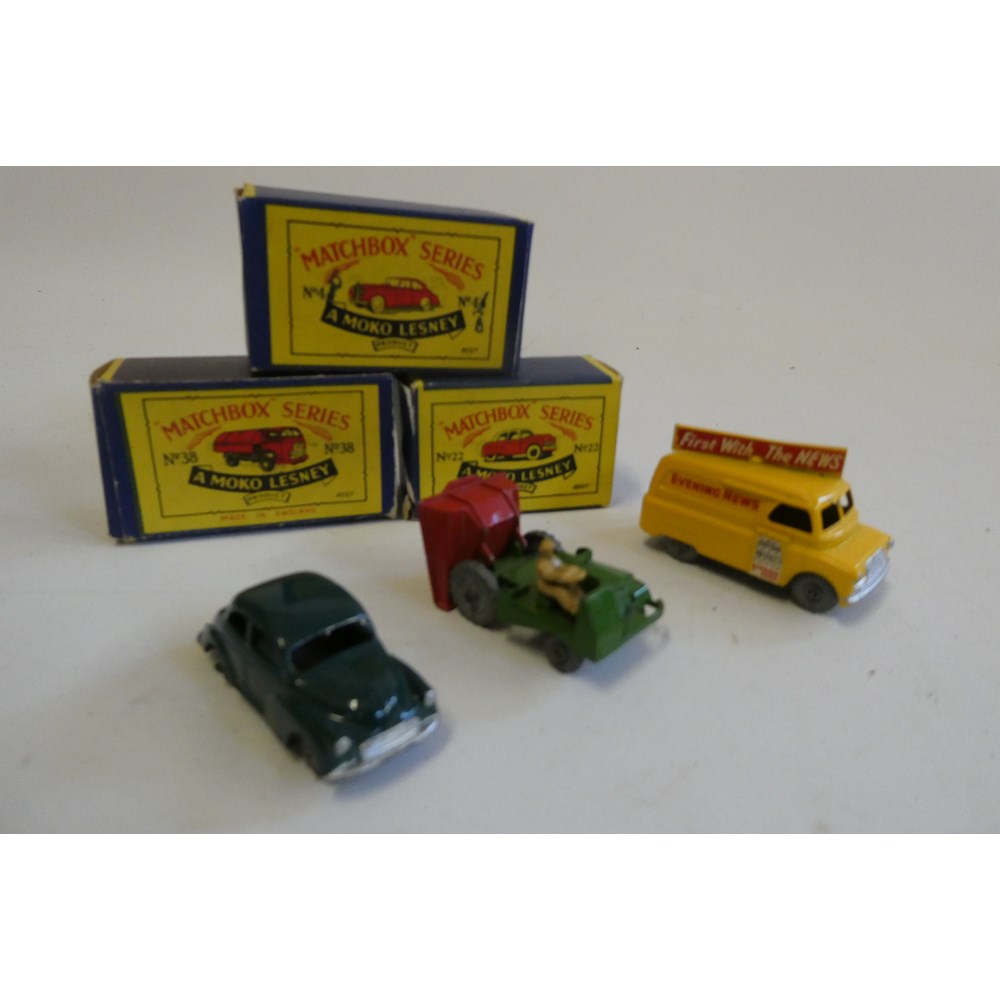 Three unboxed Matchbox vehicles comprising Yellow Bedford News van, dark green Morris Minor and Site Image