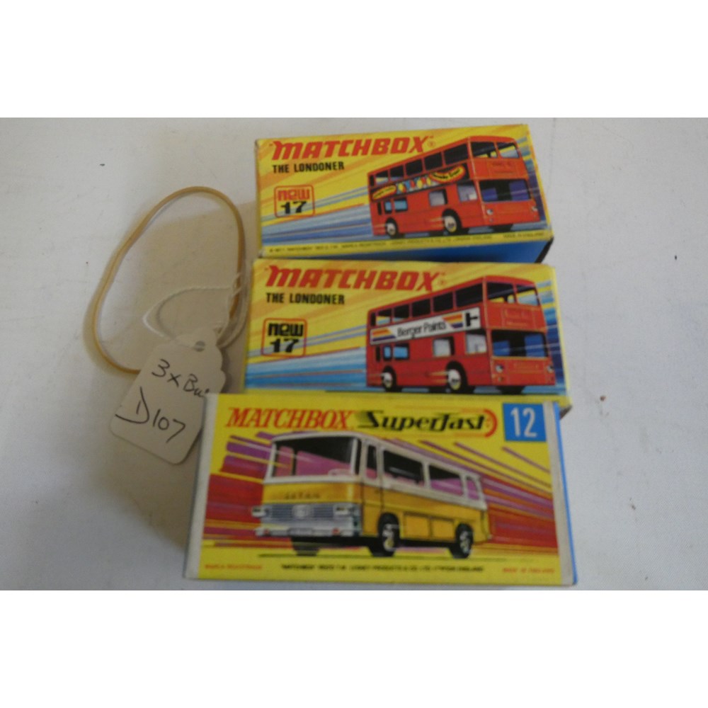 Three Matchbox Superfast Bus models comprising No.12 Setra yellow Coach and two No.17 red London Image