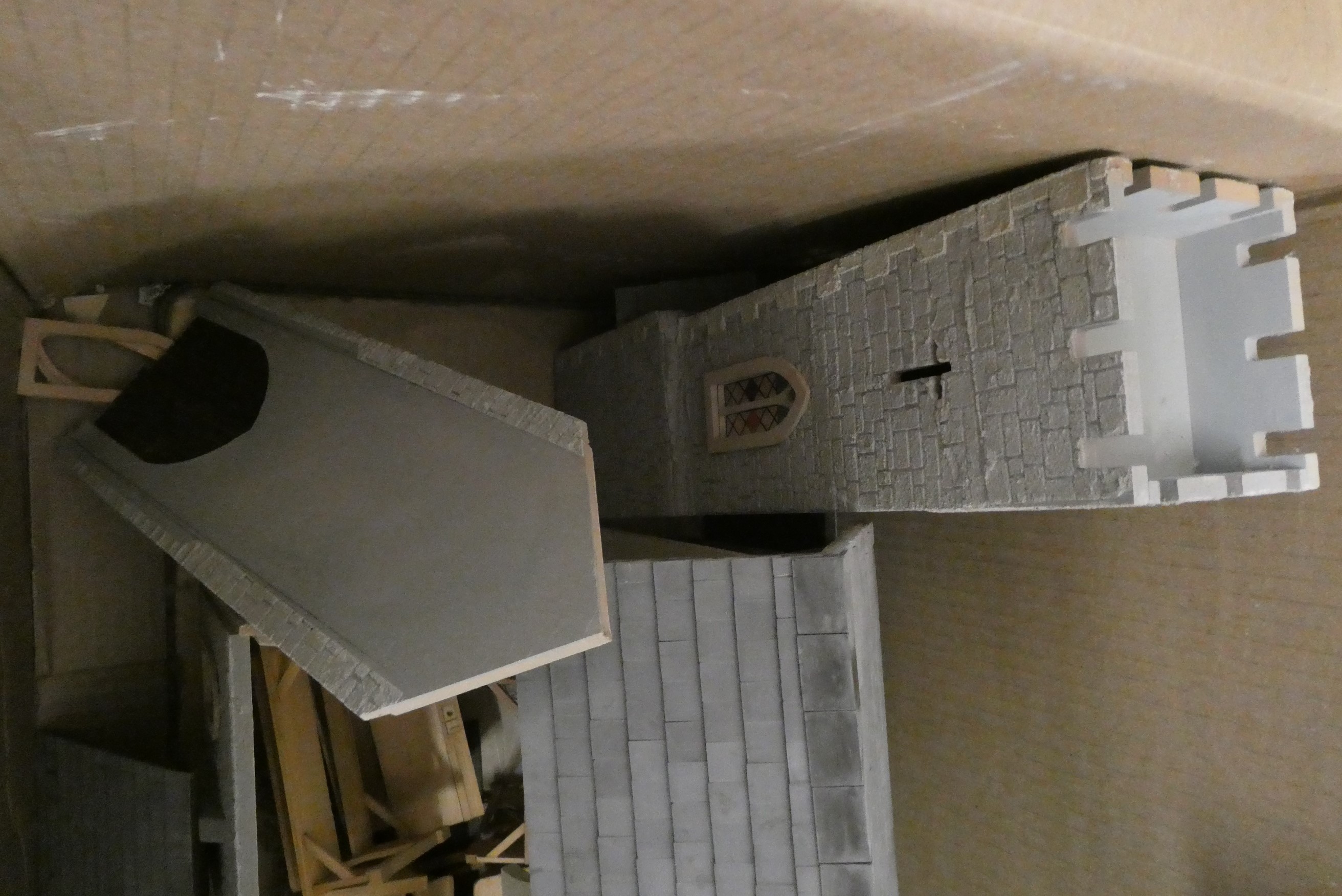 A doll's house church of wood construction with furniture including lectern, pews and school desks, Image