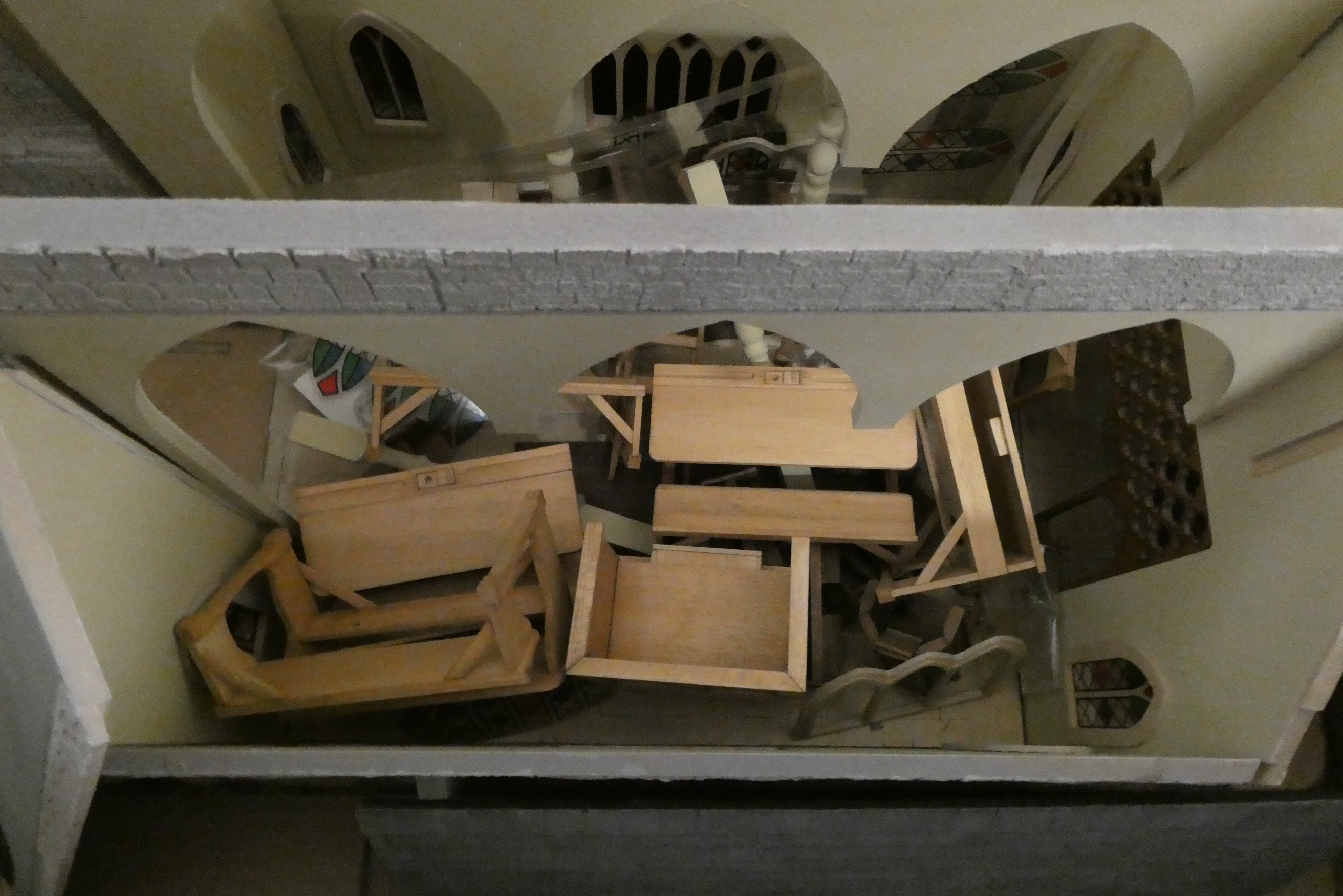 A doll's house church of wood construction with furniture including lectern, pews and school desks, Image