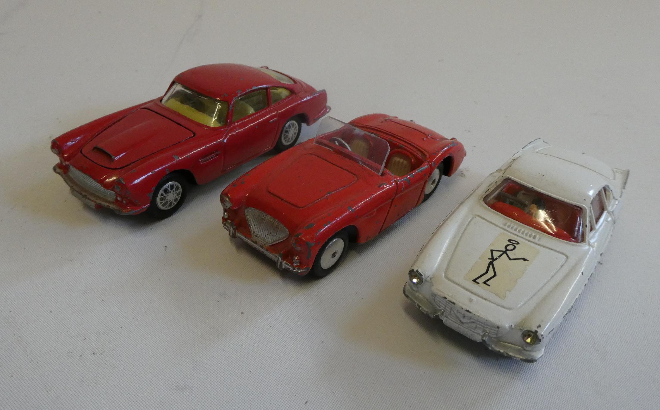 Three Corgi vehicles comprising Aston Martin DB4, Austin Healey 100 and the Saints Volvo P 1800, Image