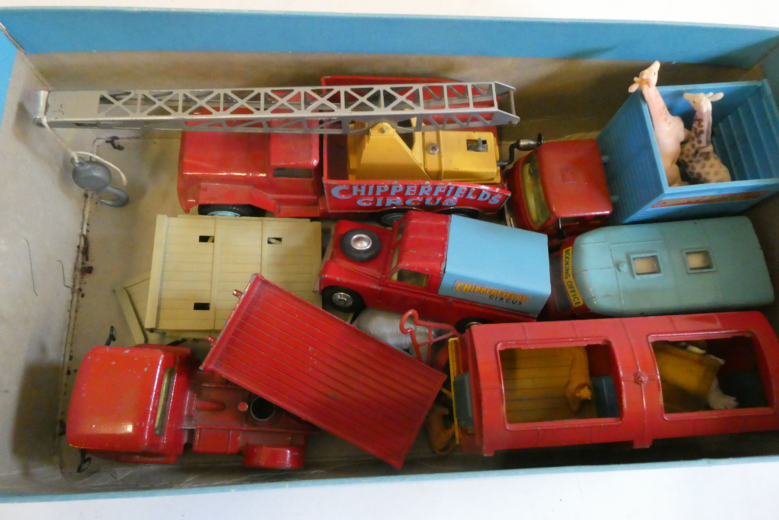 Corgi circus vehicles including crane, animal transporter and booking office, condition fair. Image