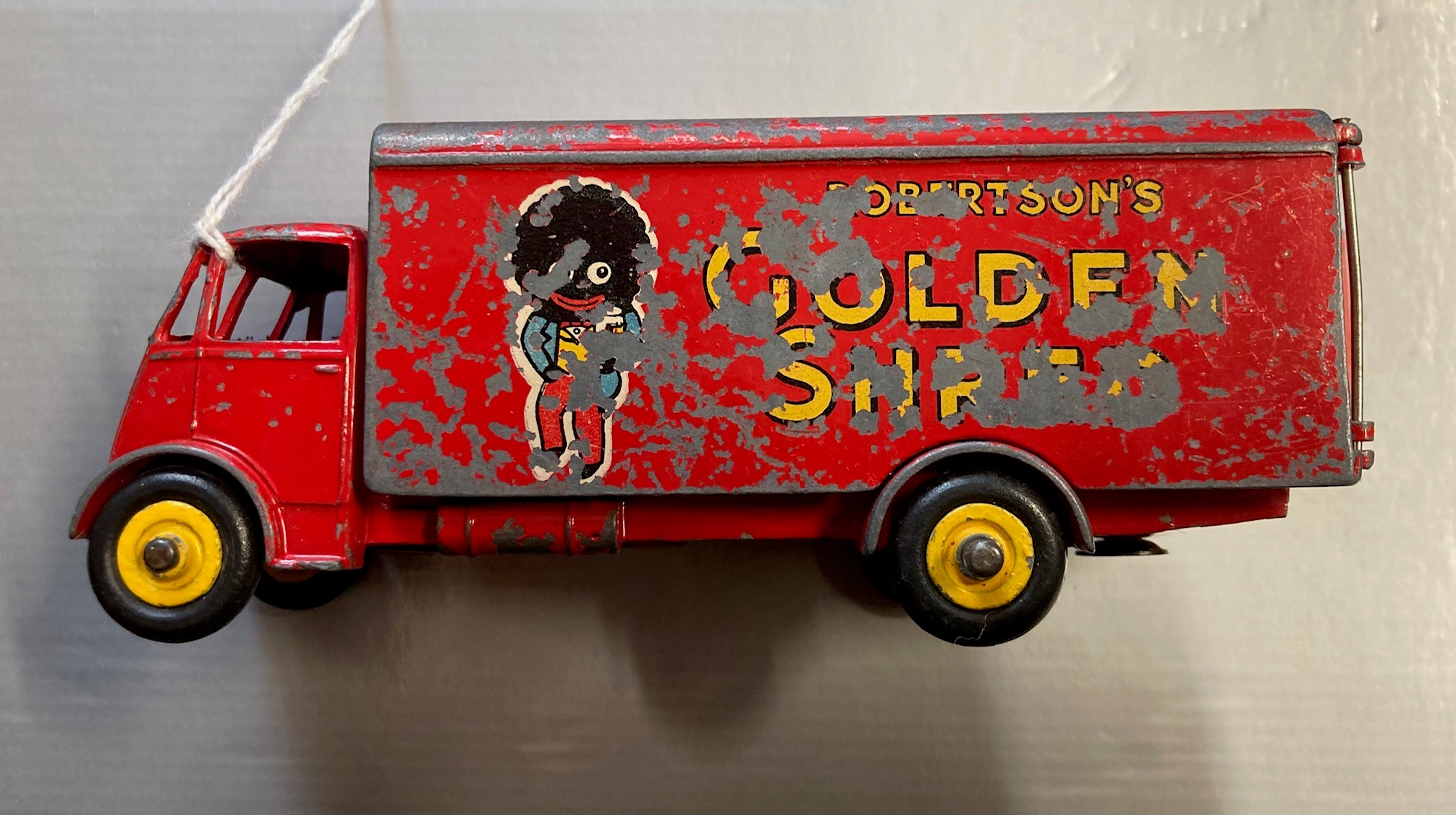 Playworn Dinky Guy van Robertsons Golden Shred, damage to paintwork and side transfer Image
