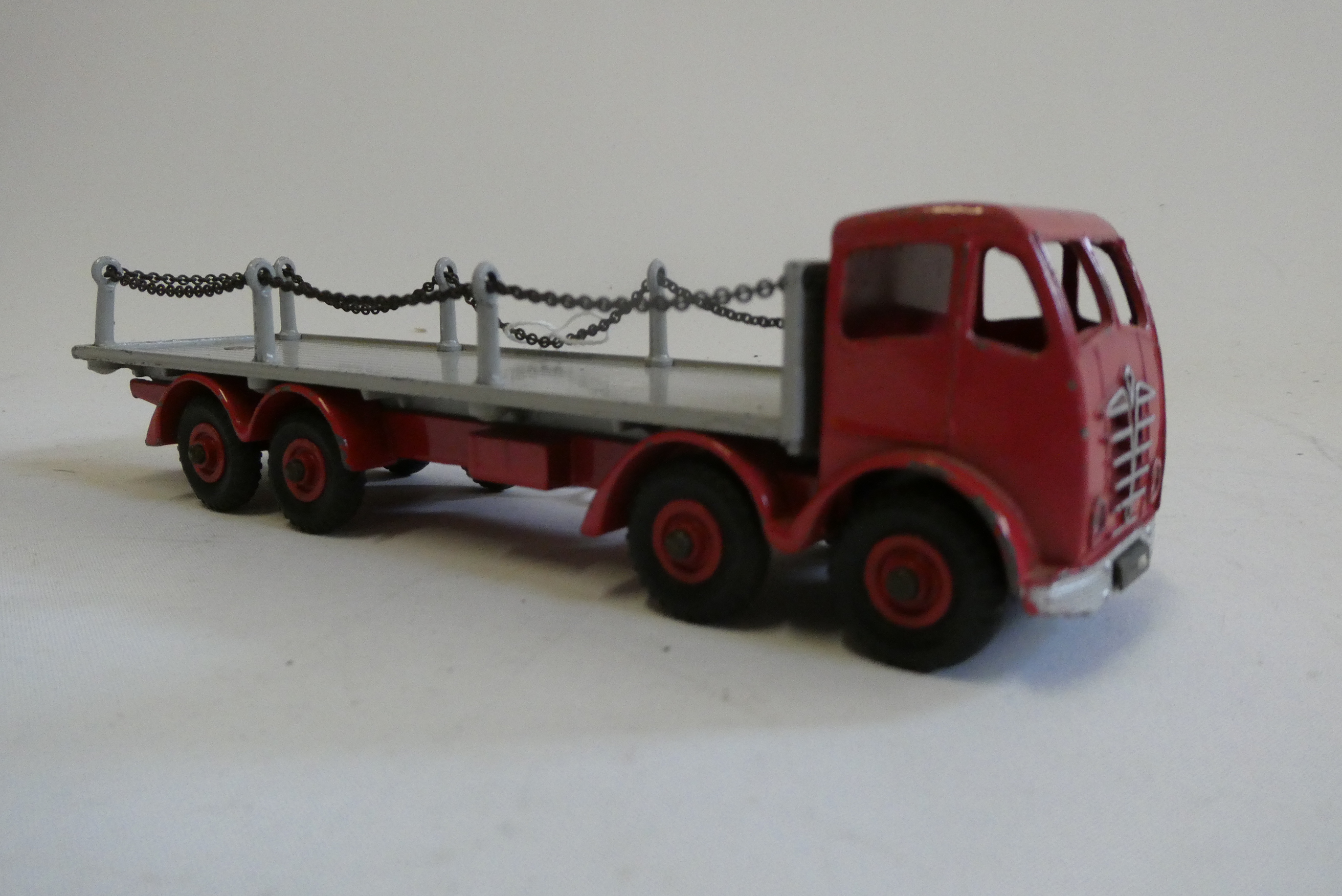 Dinky Foden Flatbed chain lorry finished in red and grey, unboxed, over all condition good+ Image