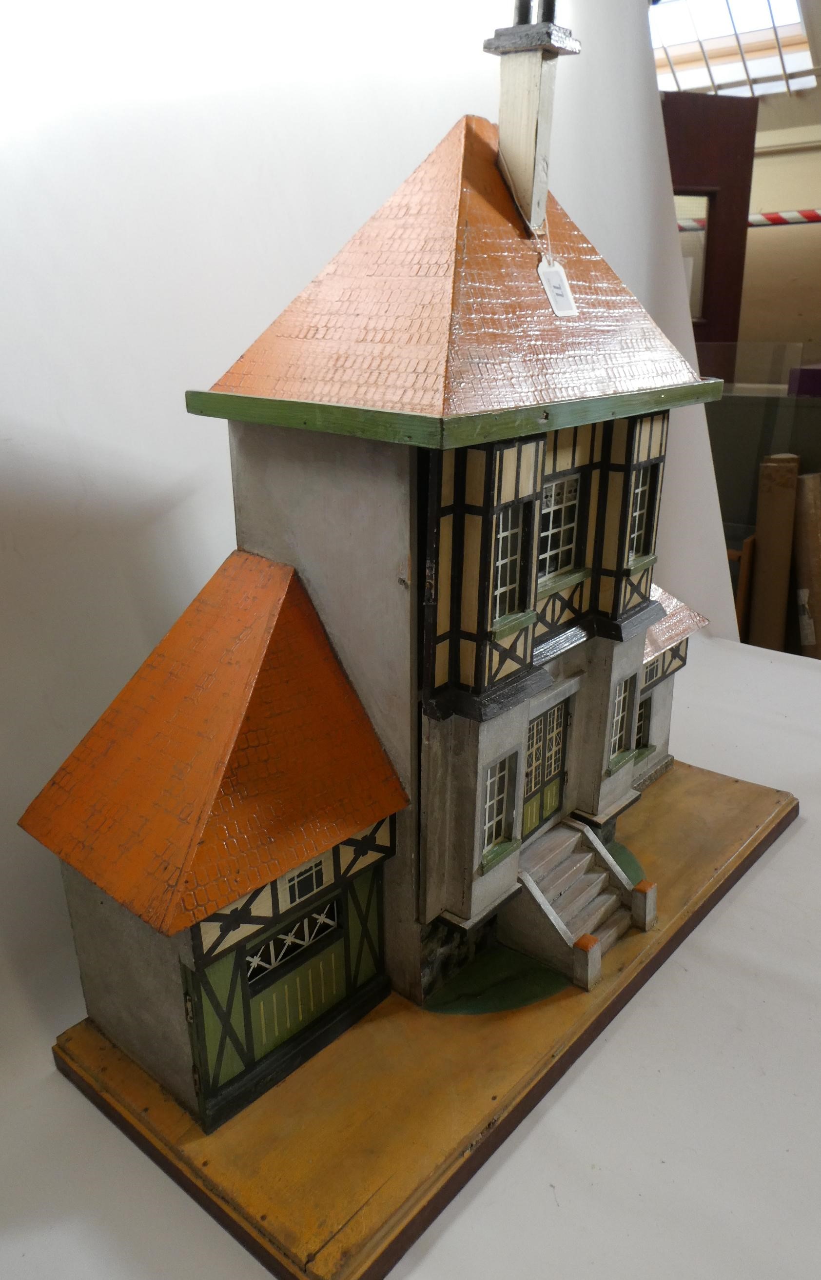 A Bavarian style German wooden dolls house, early/mid 20th century, 1/16th scale, with 2 split Image