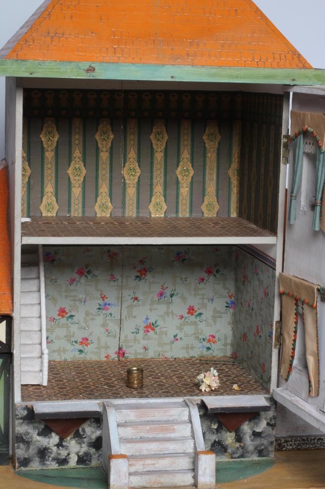 A Bavarian style German wooden dolls house, early/mid 20th century, 1/16th scale, with 2 split Image