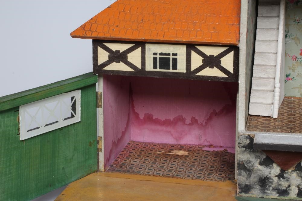 A Bavarian style German wooden dolls house, early/mid 20th century, 1/16th scale, with 2 split Image