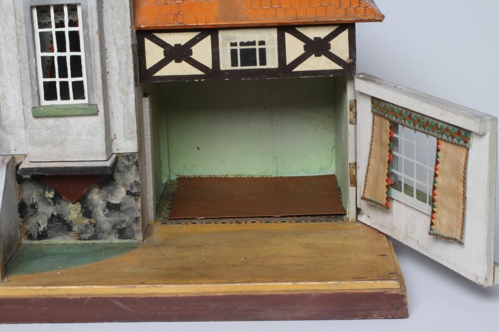 A Bavarian style German wooden dolls house, early/mid 20th century, 1/16th scale, with 2 split Image