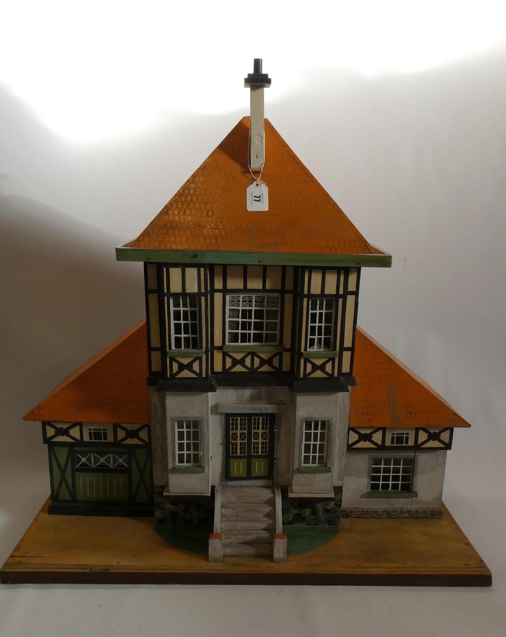 A Bavarian style German wooden dolls house, early/mid 20th century, 1/16th scale, with 2 split Image