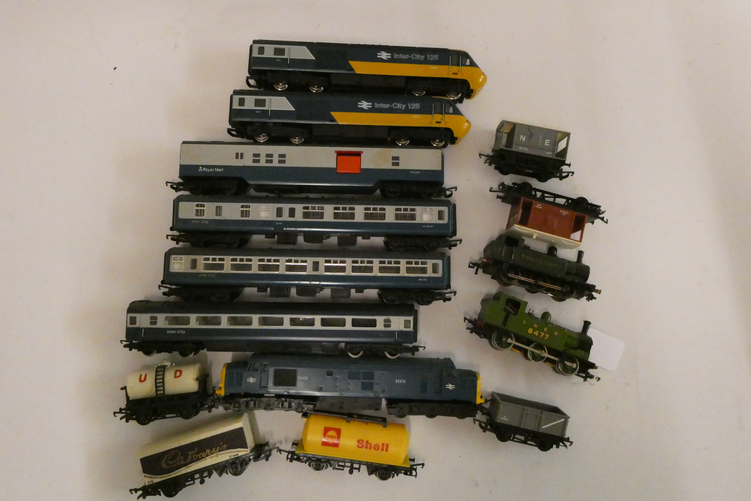 Playworn trains by Hornby and others including two tank locomotives, Intercity 125 coaches and goods Image