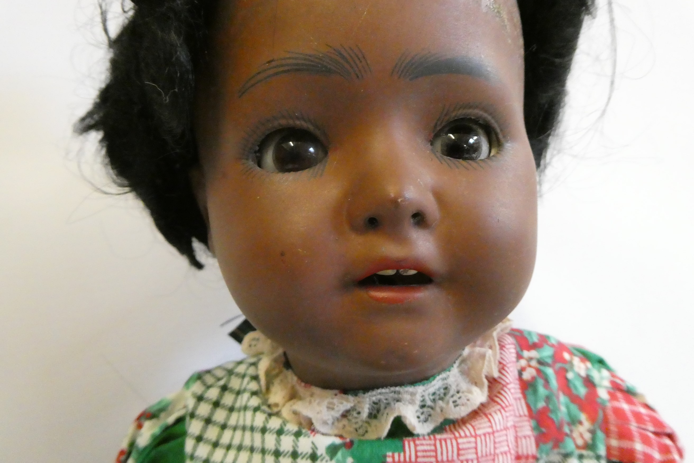 A Heubach Koppelsdorf bisque shoulder head doll, with brown glass sleeping eyes, open mouth applied Image