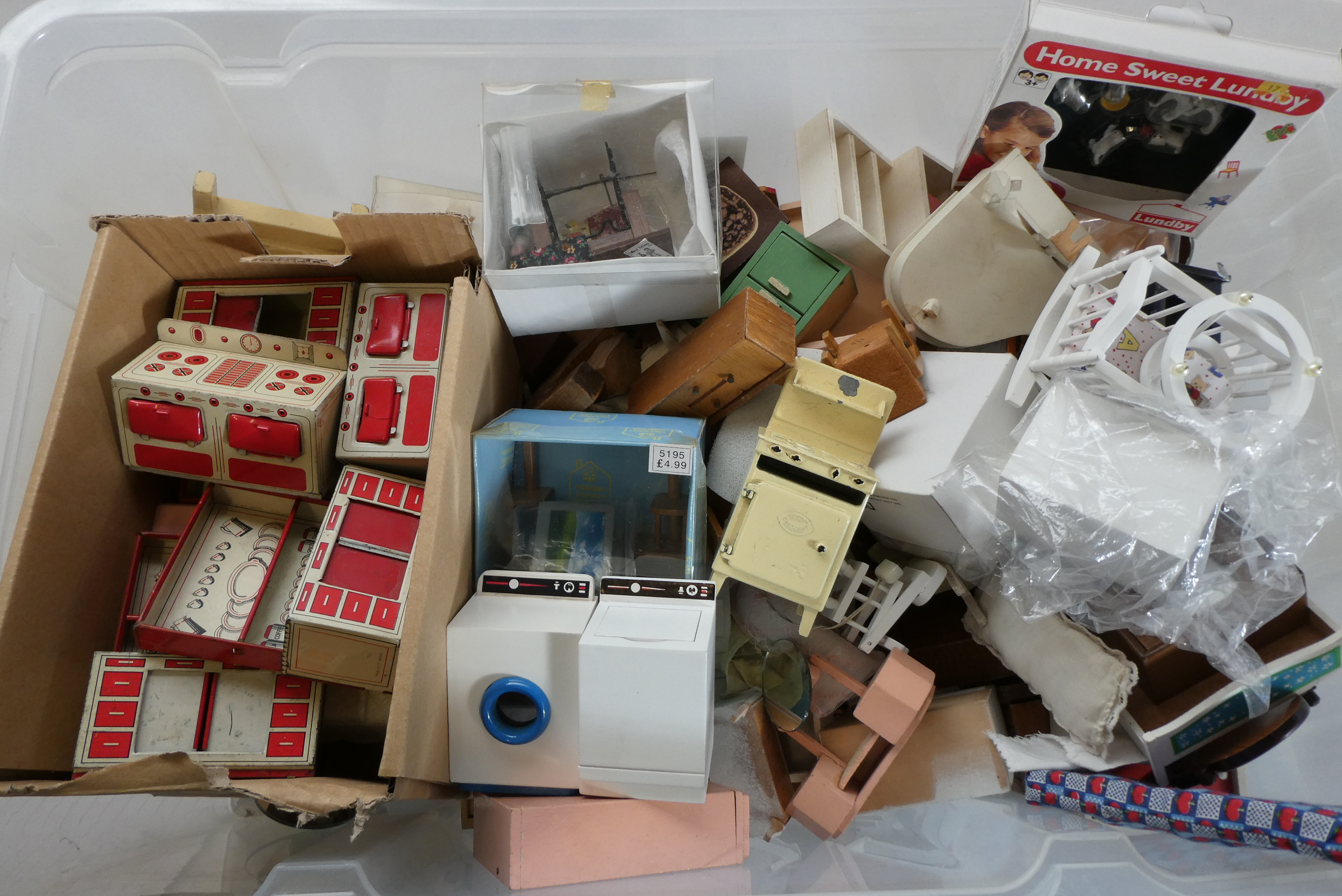 A large quantity of dolls house furniture and accessories, including mainly wood items and a a mid Image