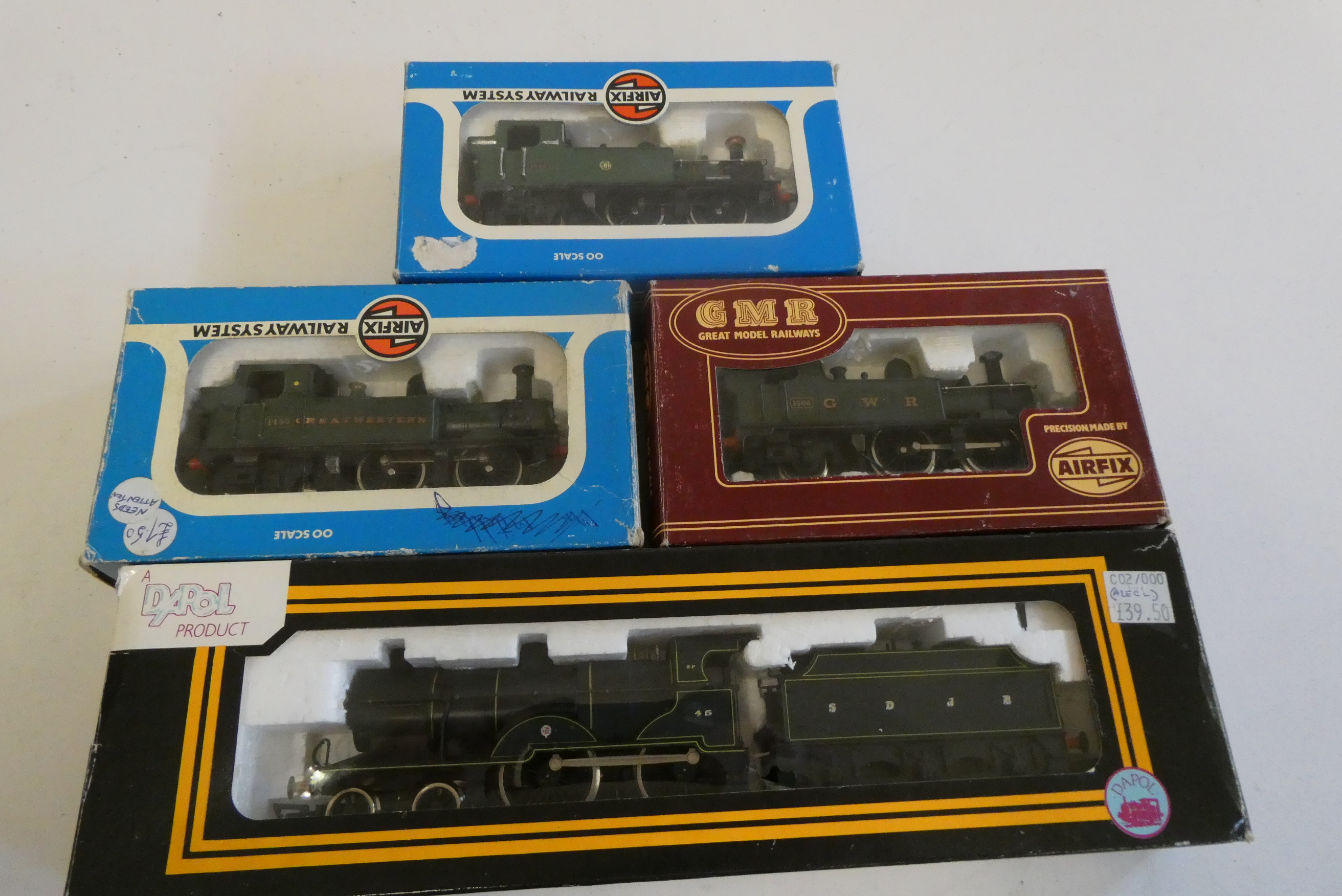 Three Class GWR 14xx tank locomotives, two have been overpainted, fair and Dapol SDJR 2P finished in Image