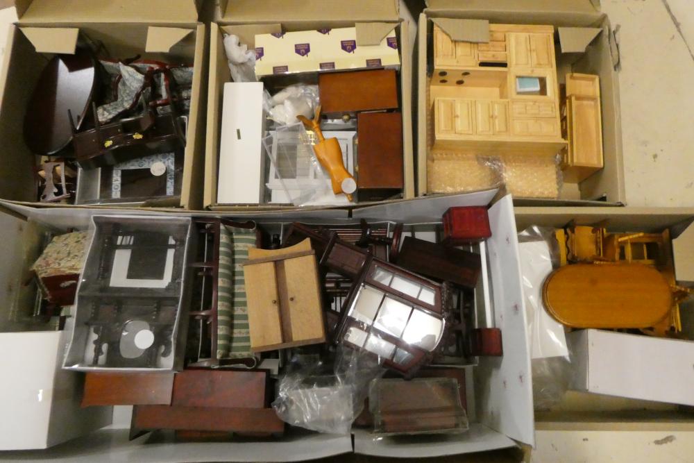 Five boxes of dolls house furniture and accessories, including wood furniture, upholstered suites Image