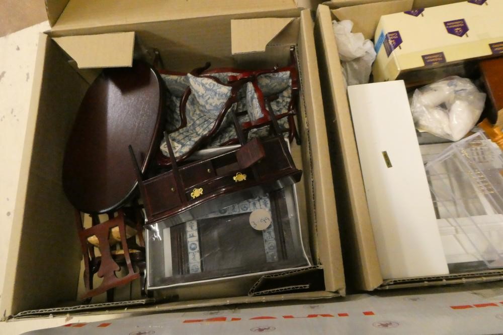 Five boxes of dolls house furniture and accessories, including wood furniture, upholstered suites Image