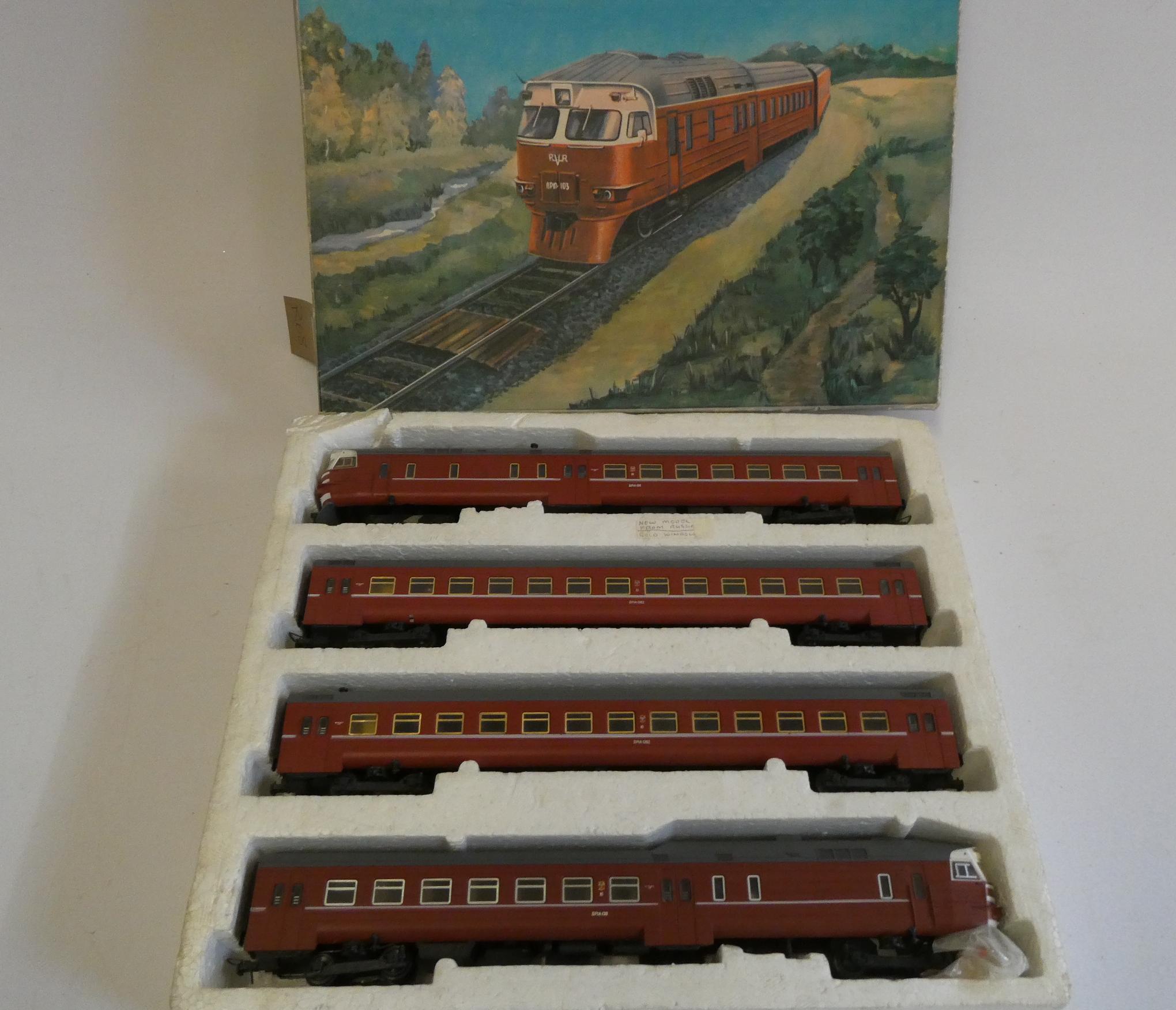 Russian made diesel train comprising four car diesel in red, good Image