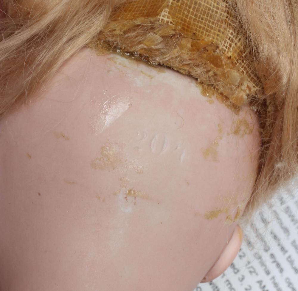A bisque socket head doll Image