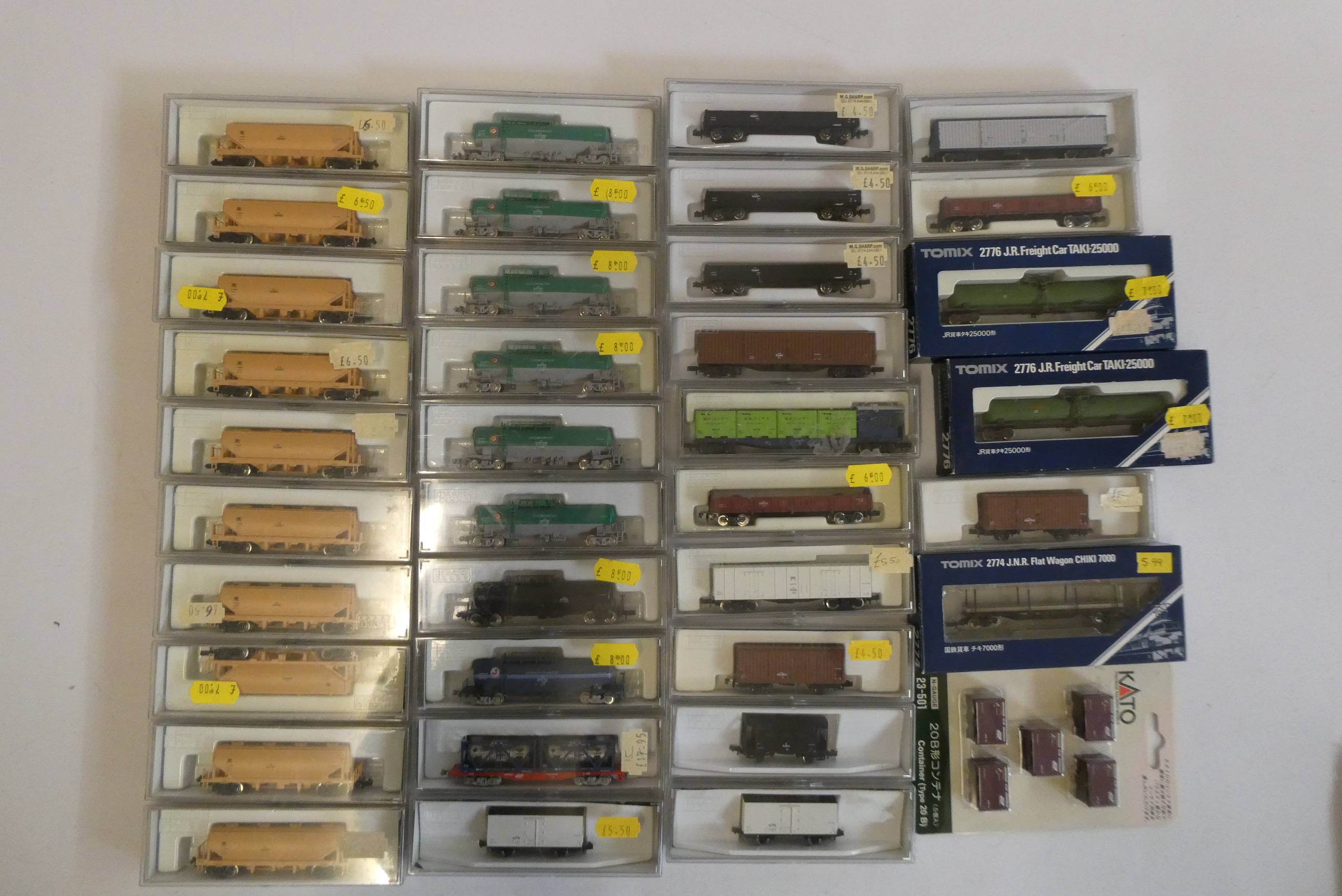 Forty four Japanese railways goods wagons, all items boxed, excellent to mint and TOMIX rail Image