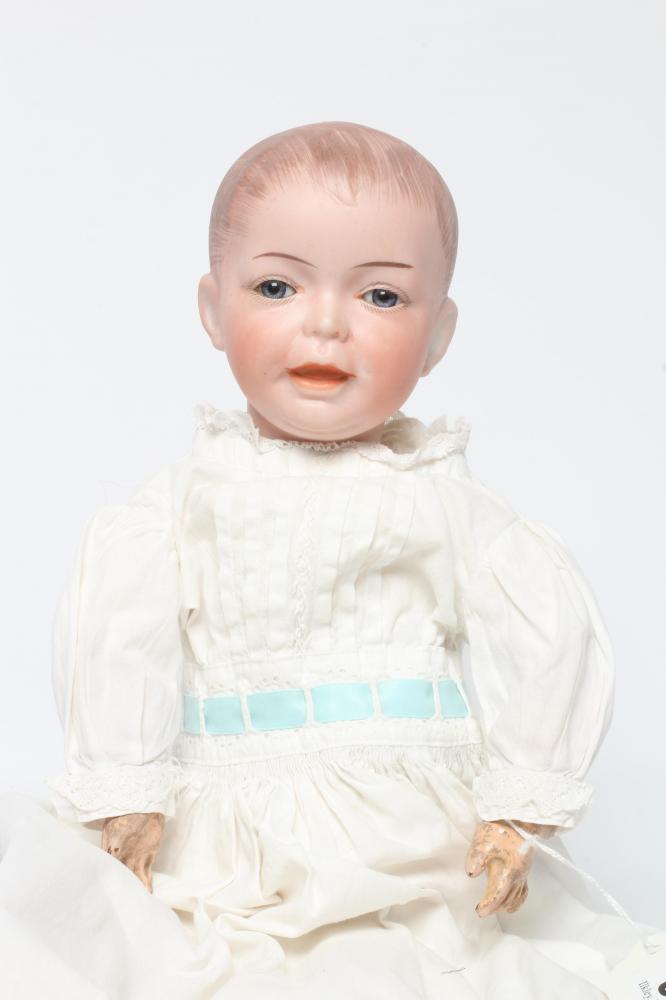 An SFBJ bisque socket head character boy doll, with blue glass fixed eyes, moulded open mouth, Image