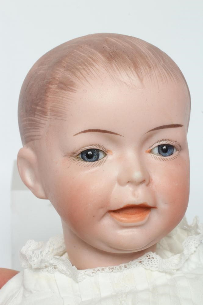An SFBJ bisque socket head character boy doll, with blue glass fixed eyes, moulded open mouth, Image