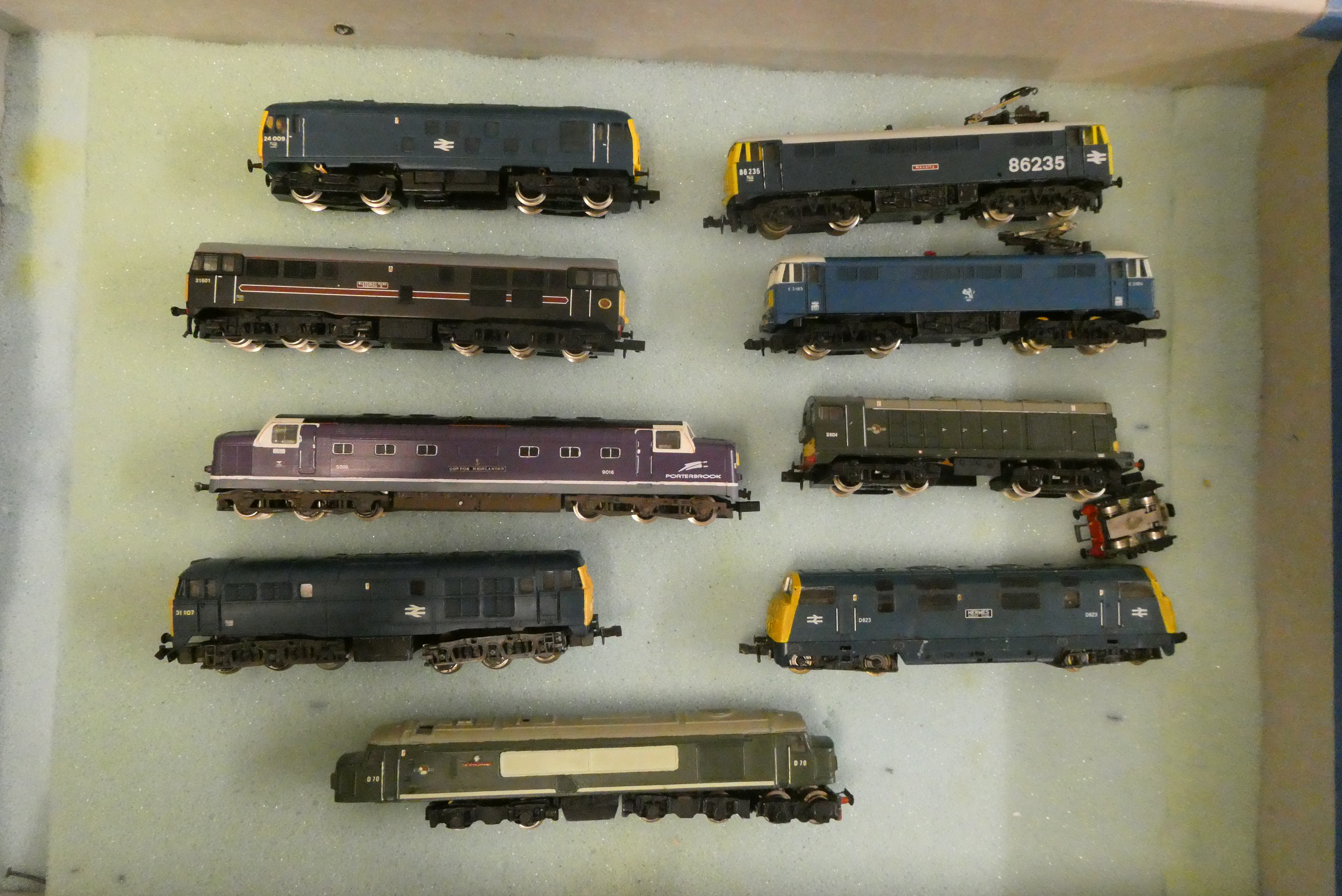 Nine unboxed N gauge locomotives by Lima and others, most models modern, image types and two static Image