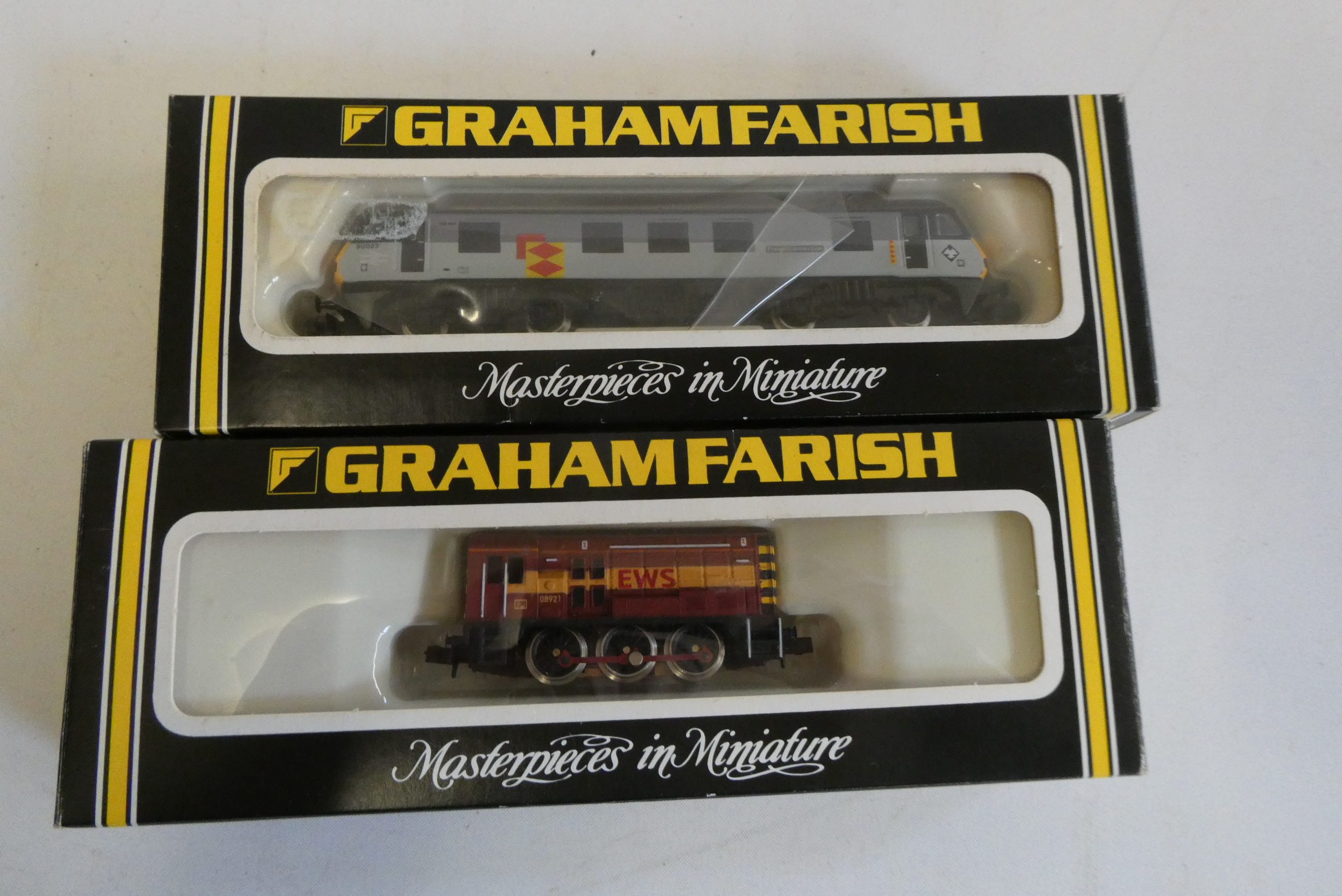 Graham Farish Class 90 electric locomotive in rail freight, livery and Class 8 diesel in EWS livery, Image