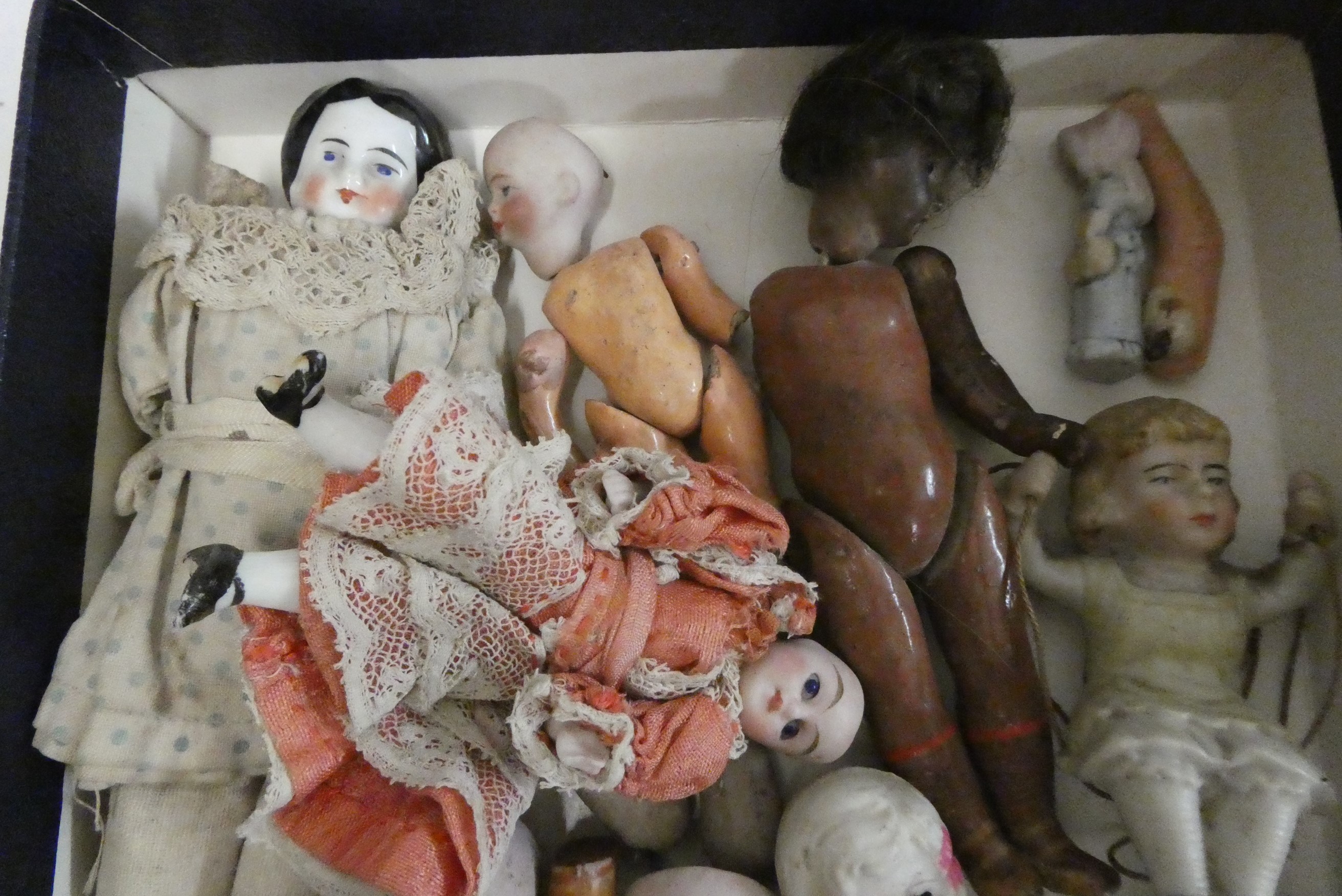 Collection of miniature dolls, including an all bisque nippon doll, a Victorian china head doll and Image