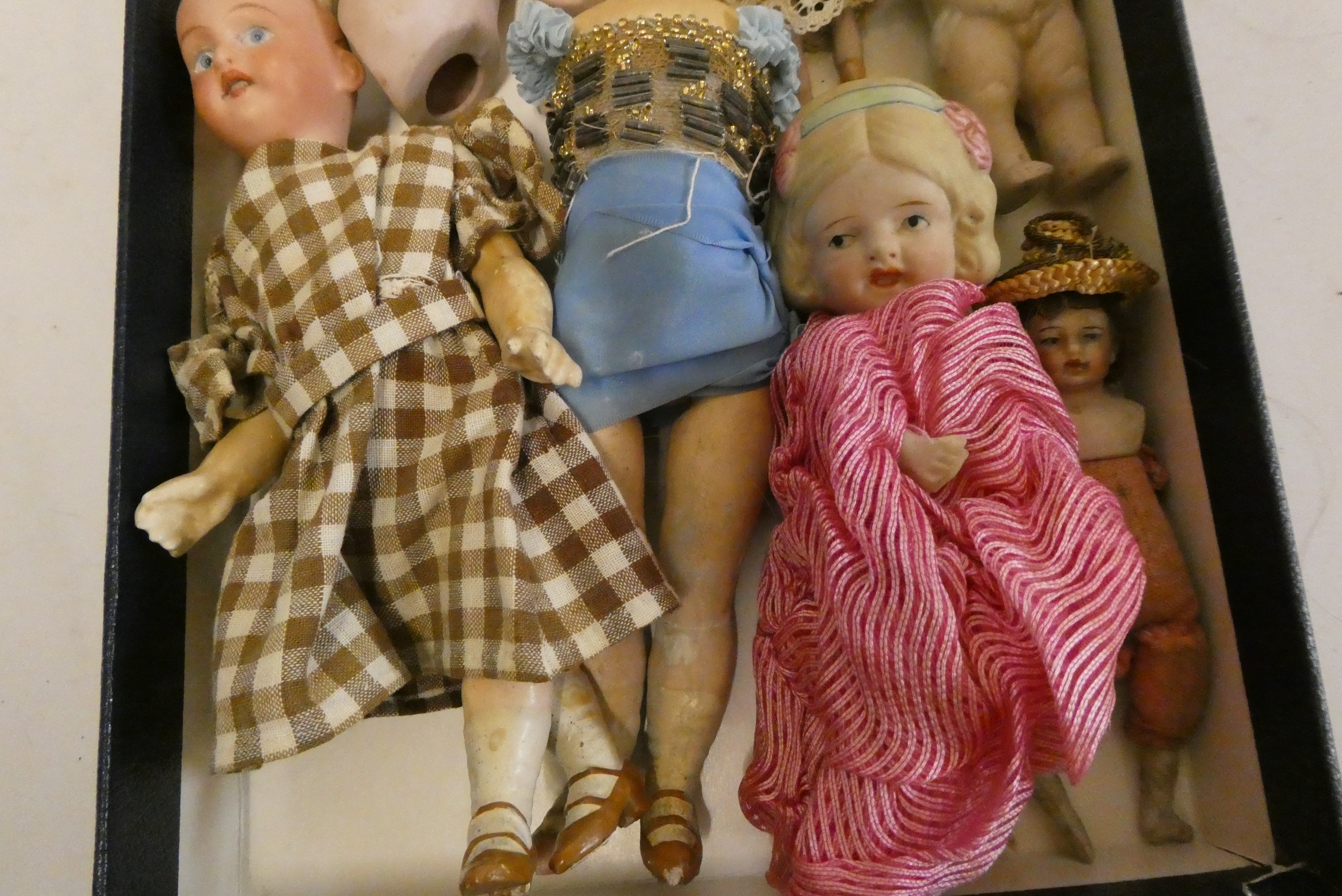 Collection of miniature dolls, including an all bisque nippon doll, a Victorian china head doll and Image