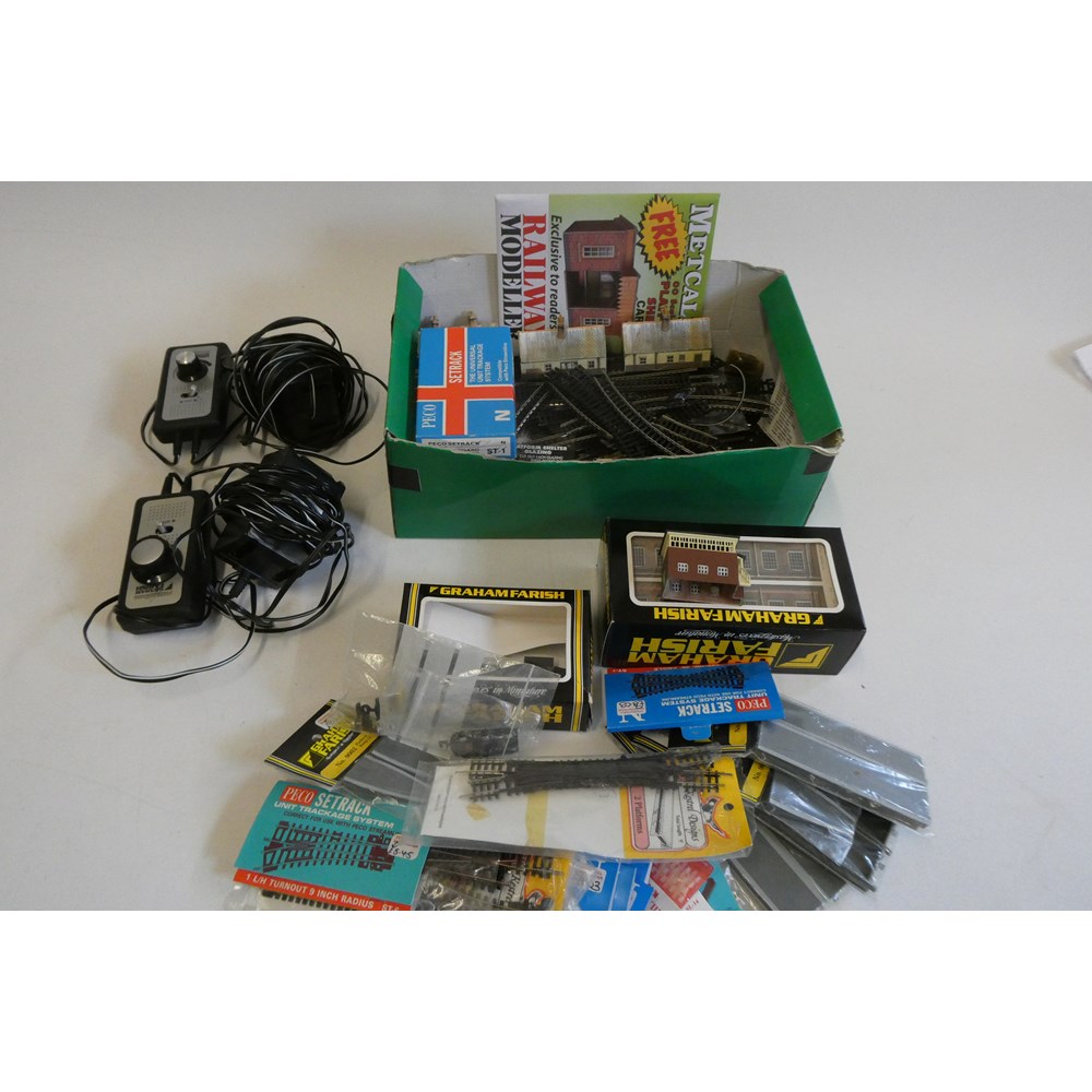 N gauge track and accessories including set track and point 12v controllers, trackside building and Image