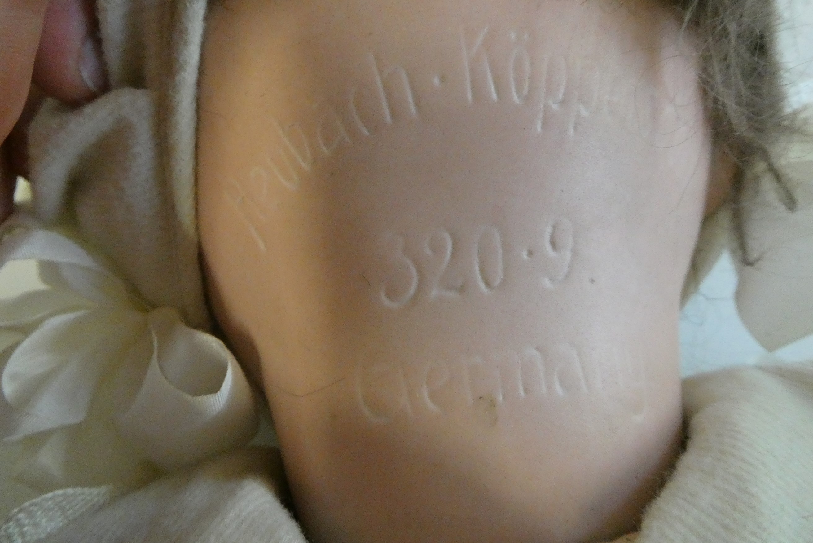 A Heubach Koppelsdorf bisque socket head character doll Image