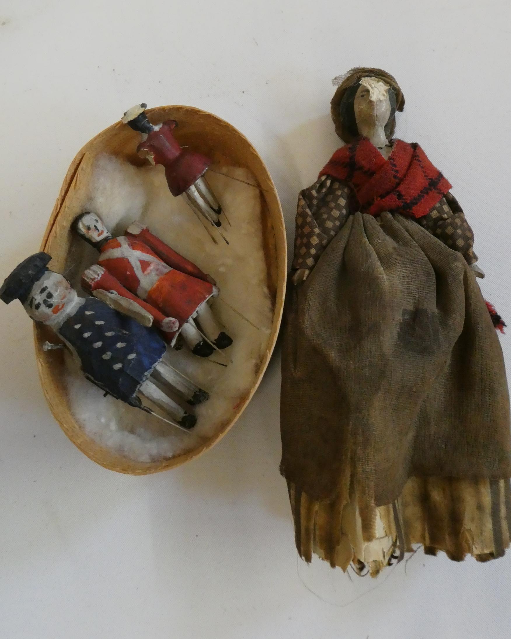 Three wooden piano dolls, c.1880, with painted features and jointed legs, largest 2 1/4" long, Image
